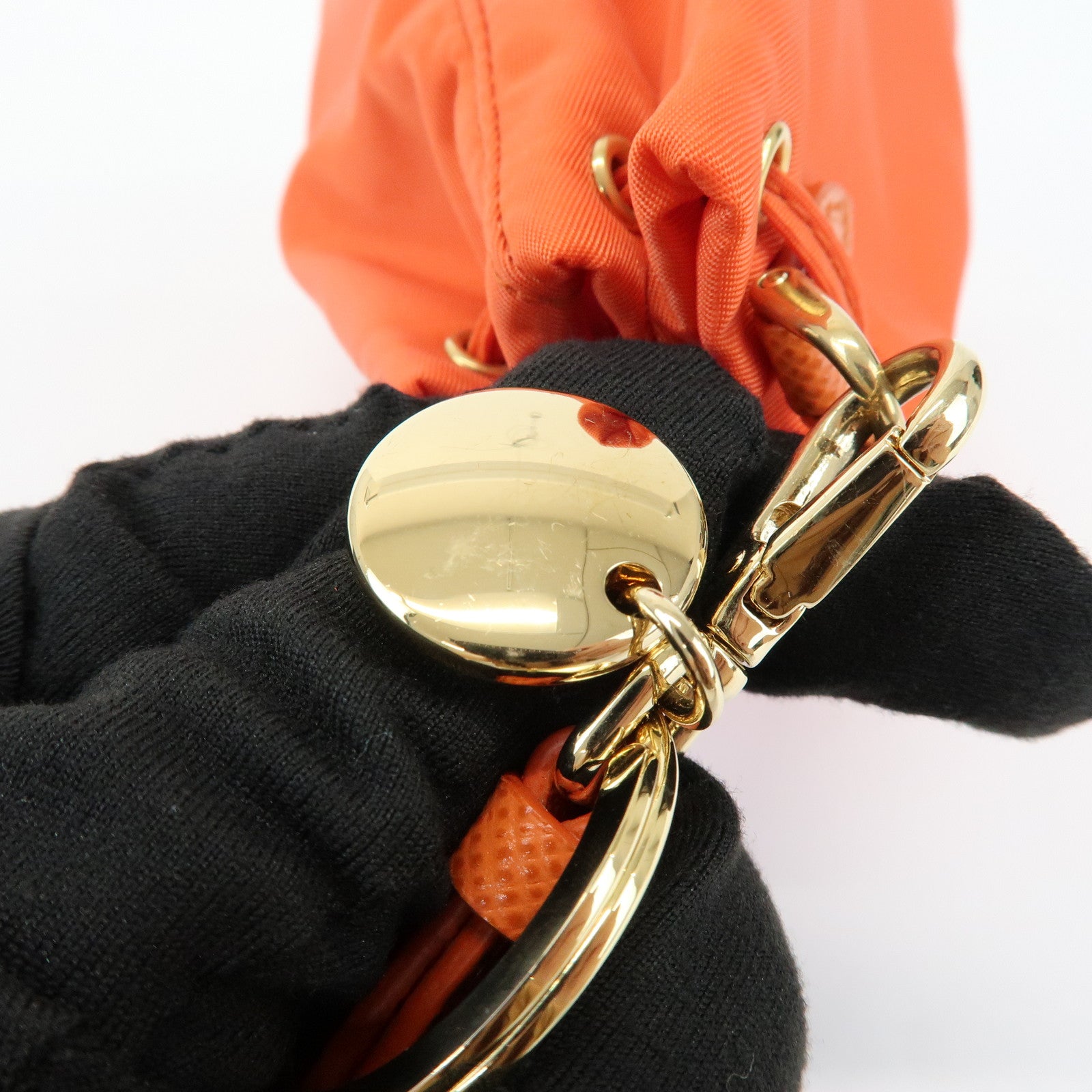 PRADA Triangle Logo Nylon Drawstring Wrist Bag Orange 1TT202