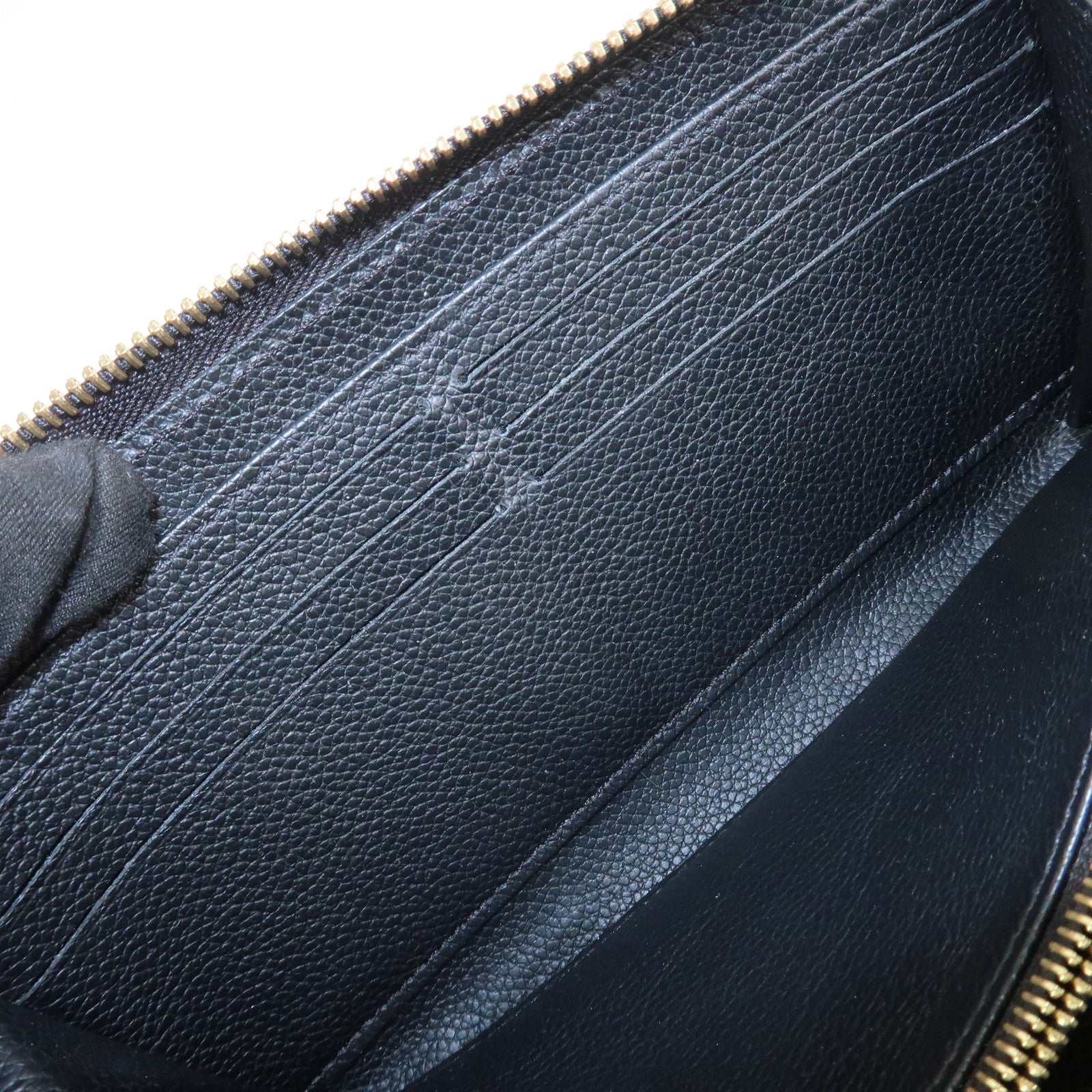 Louis Vuitton Monogram Empreinte Leather Round Zippy Wallet M61864