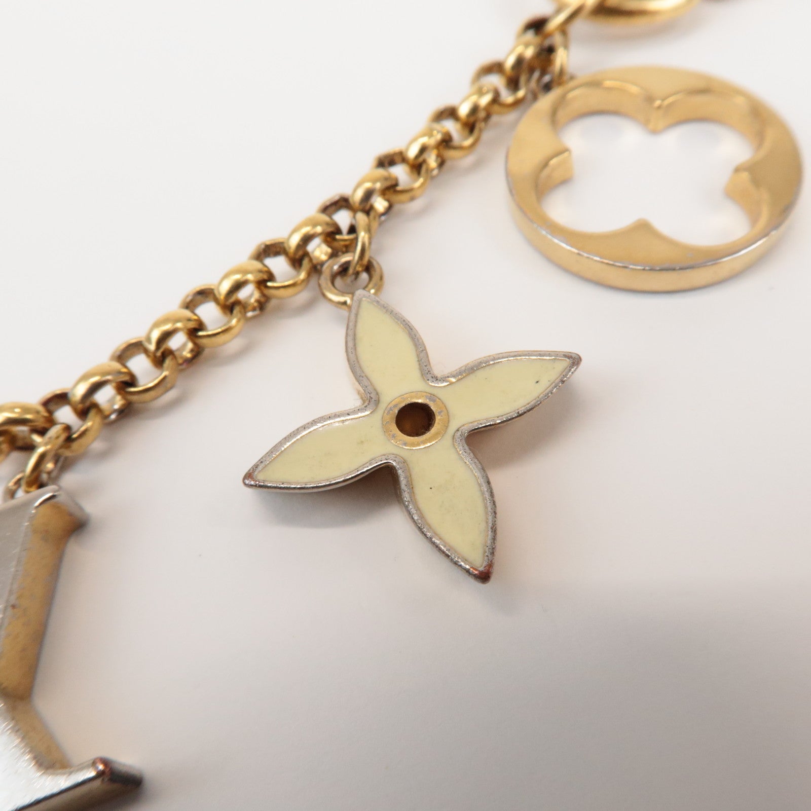 Louis Vuitton Fleur de Monogram Bag Charm Key Chain Gold M65111