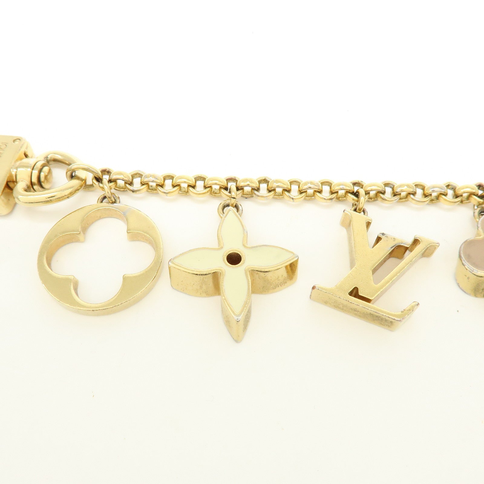Louis Vuitton Fleur de Monogram Bag Charm Key Chain Gold M65111