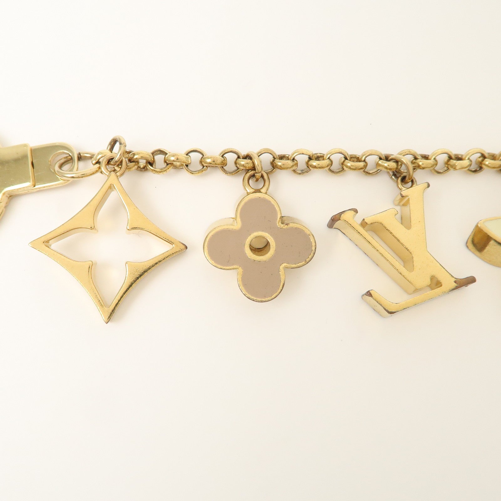Louis Vuitton Fleur de Monogram Bag Charm Key Chain Gold M65111