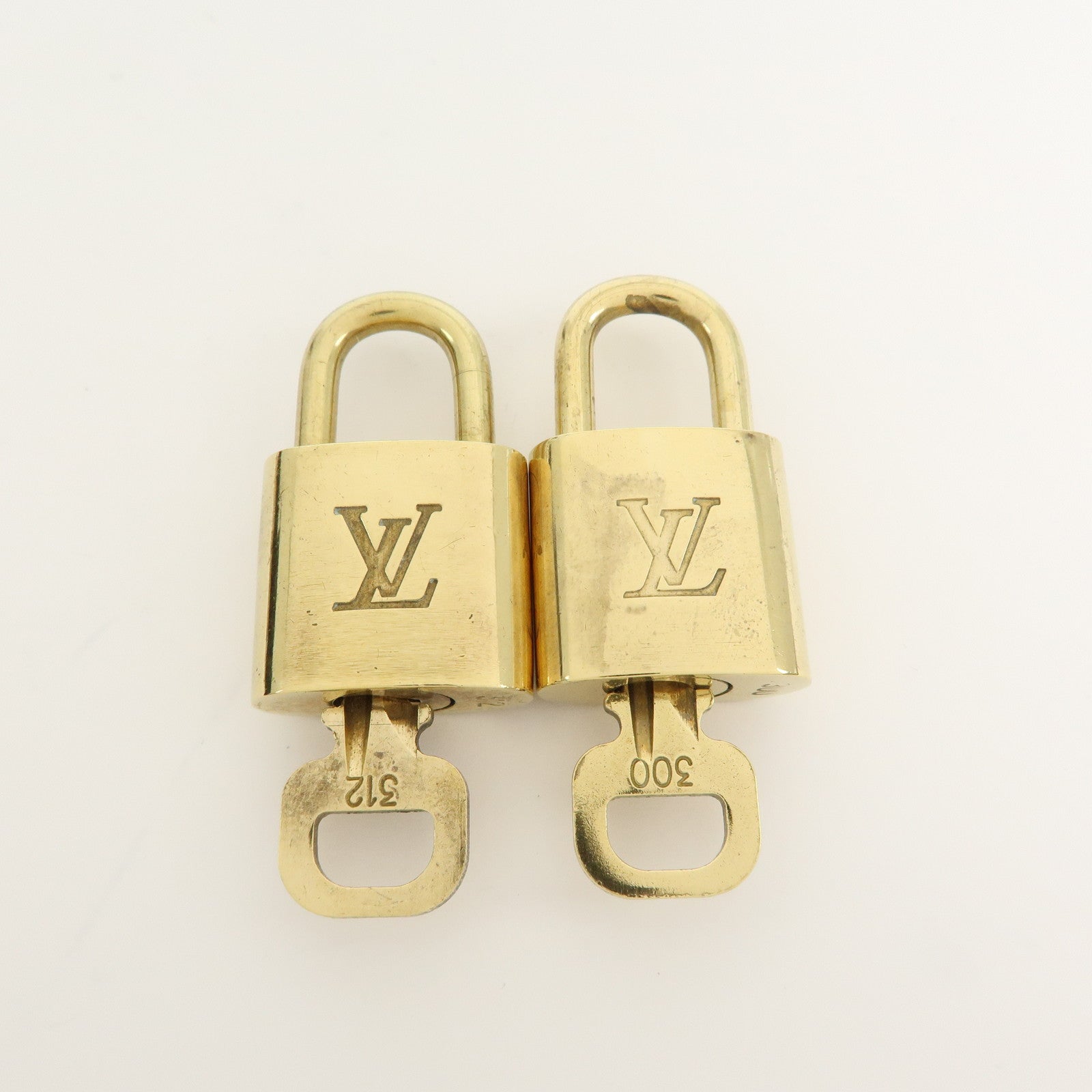 Louis Vuitton Set of 10 Lock & Key Cadena Key Lock Gold