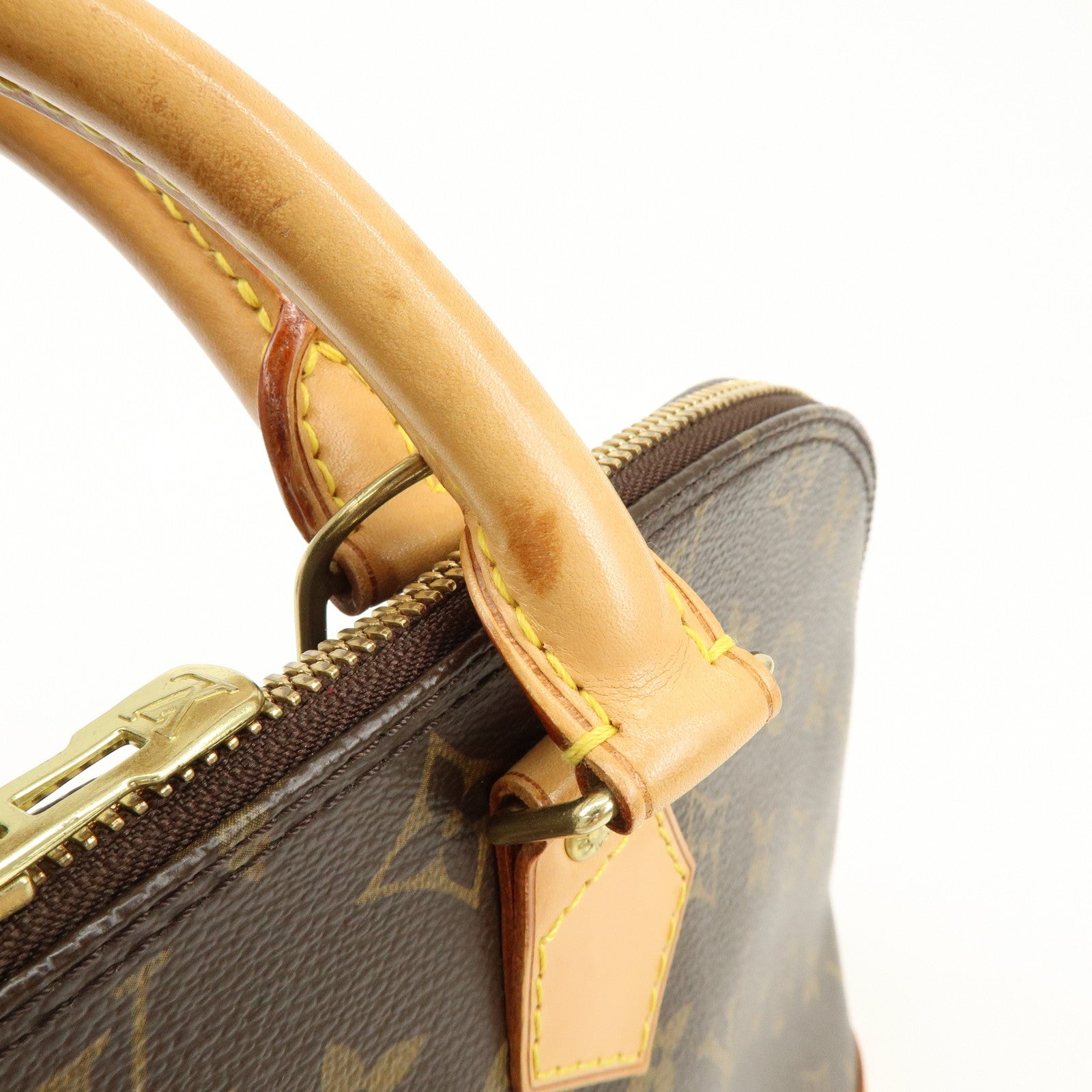 Louis Vuitton Monogram Alma Hand Bag Brown M51130
