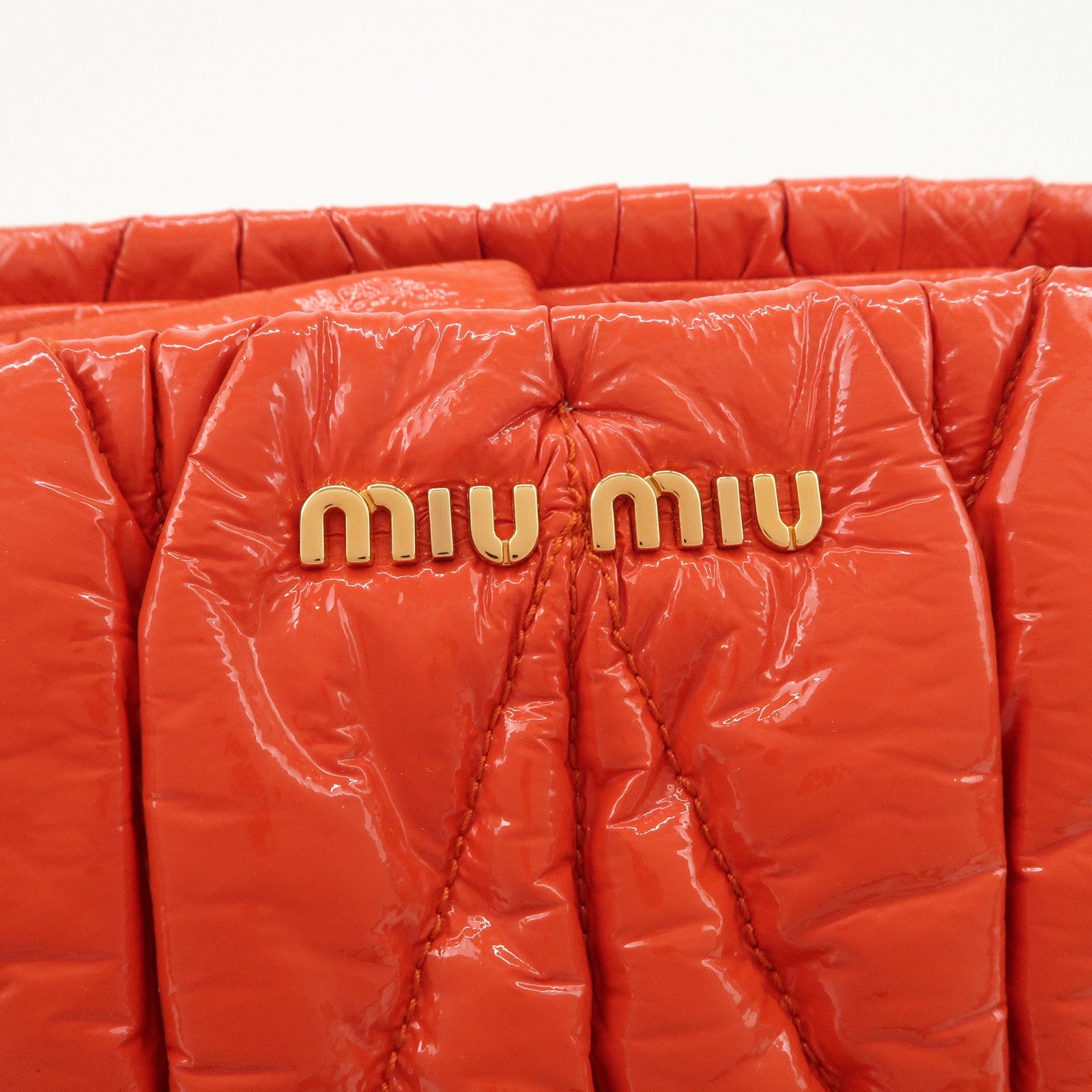 MIUMIU Matelasse Enamel Leather Clutch Bag Pouch Orange