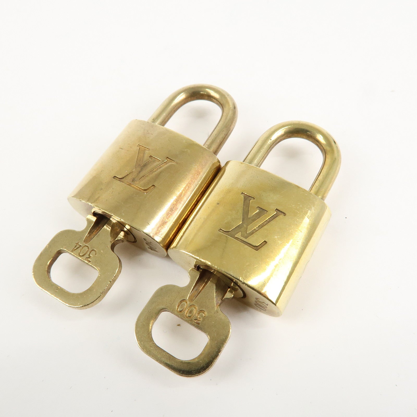 Louis Vuitton Set of 10 Lock & Key Cadena Key Lock Metal Gold