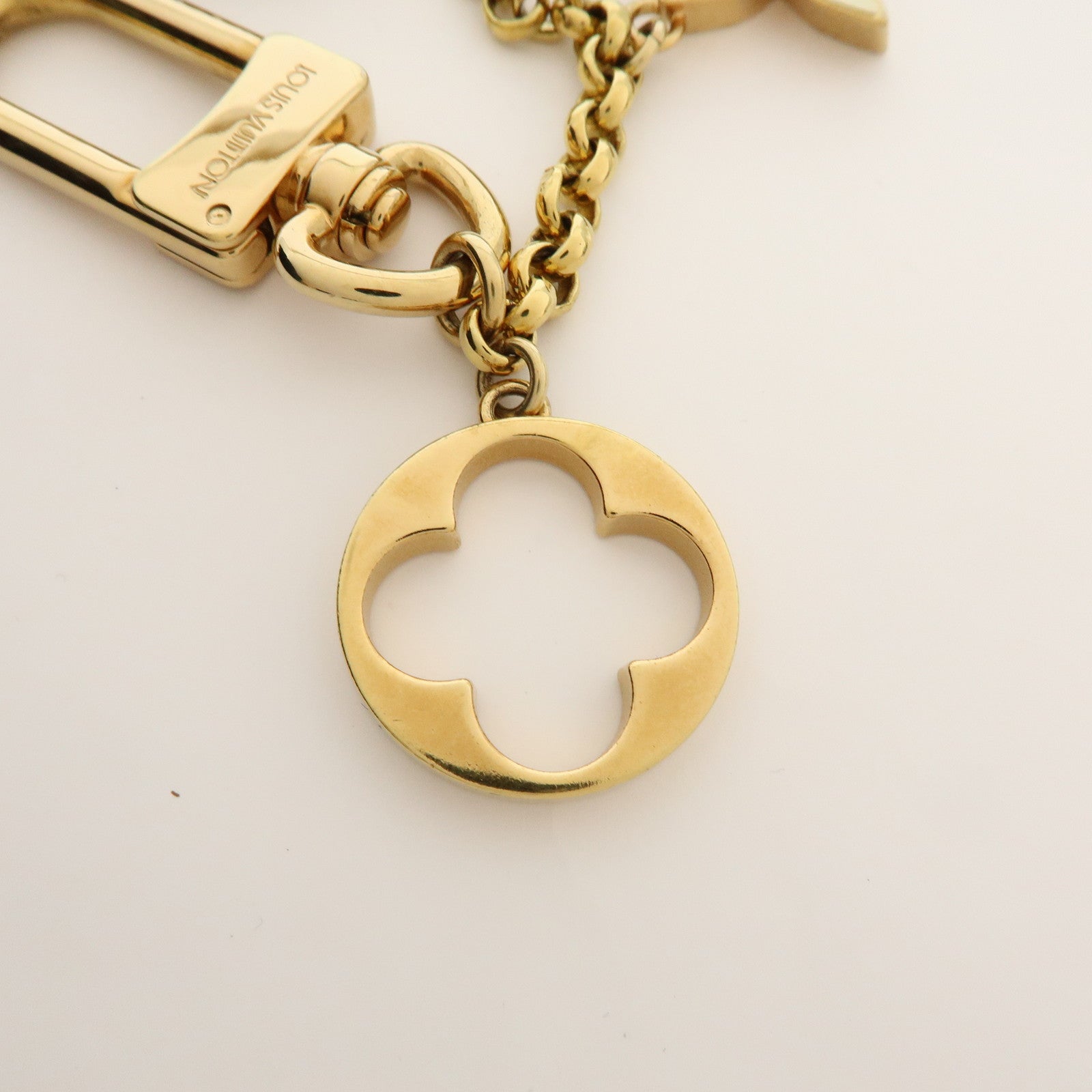 Louis Vuitton Fleur de Monogram Bag Charm Key Chain Gold M65111