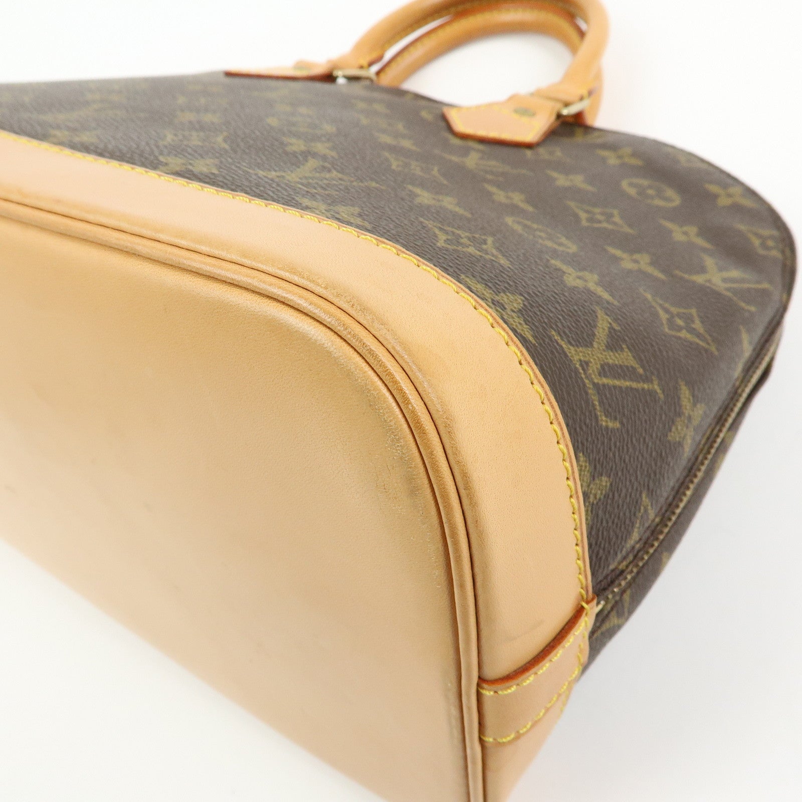 Louis Vuitton Monogram Alma Hand Bag Brown M51130