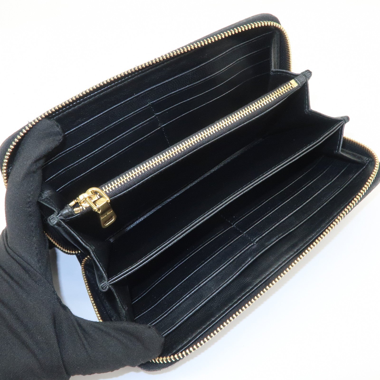 MIU MIU Logo Matelasse Nappa Leather Zippy Long Wallet Black