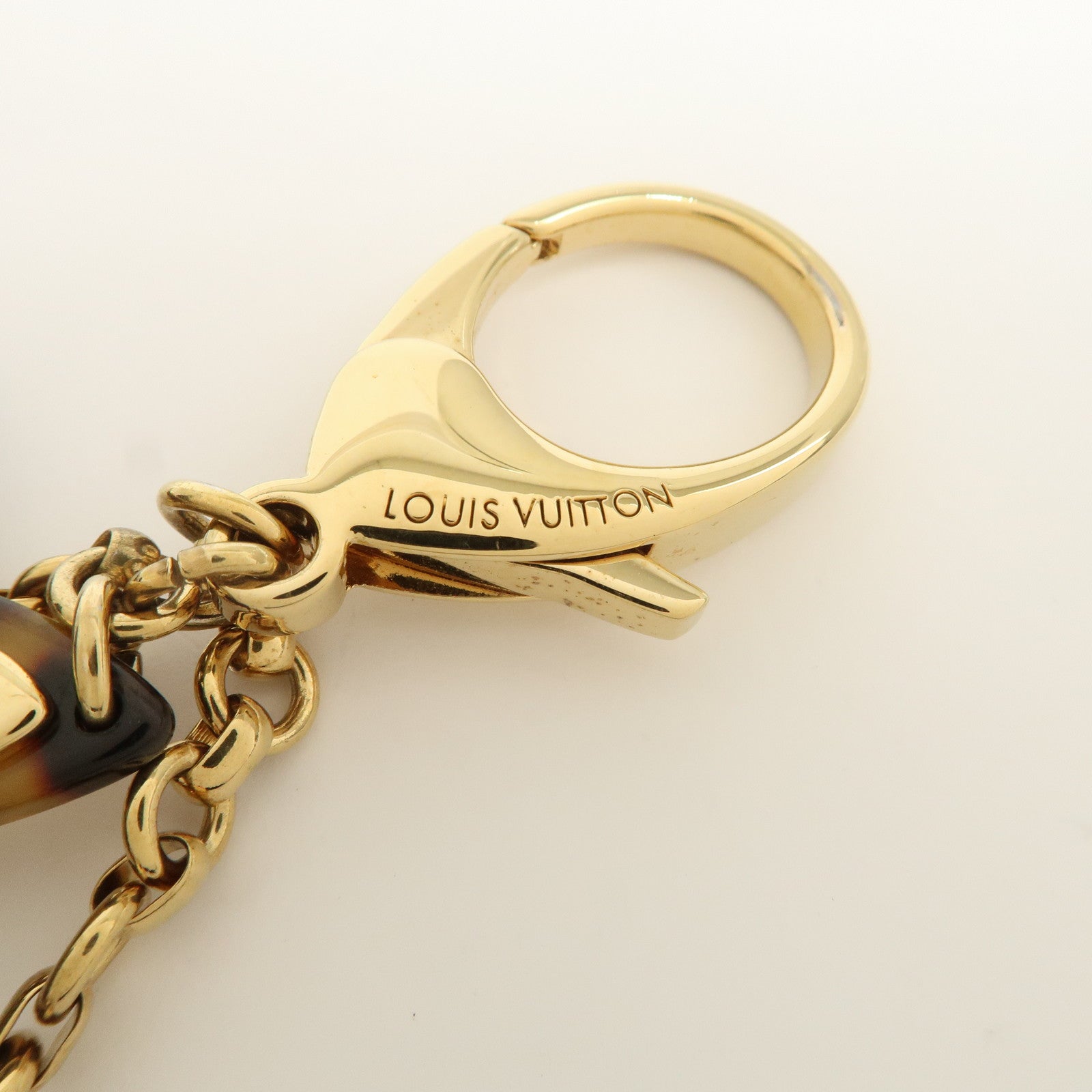 Louis Vuitton Bijou Sac Insolence Bag Charm Gold Brown M65844