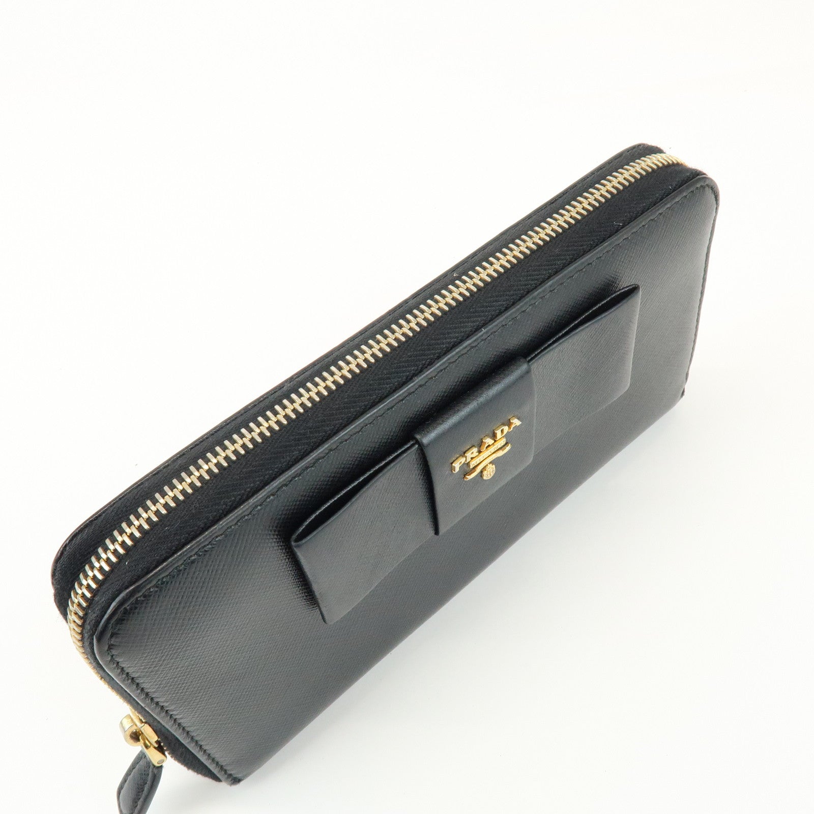 PRADA Saffiano Leather Ribbon Round Zippy Wallet Black 1M0506