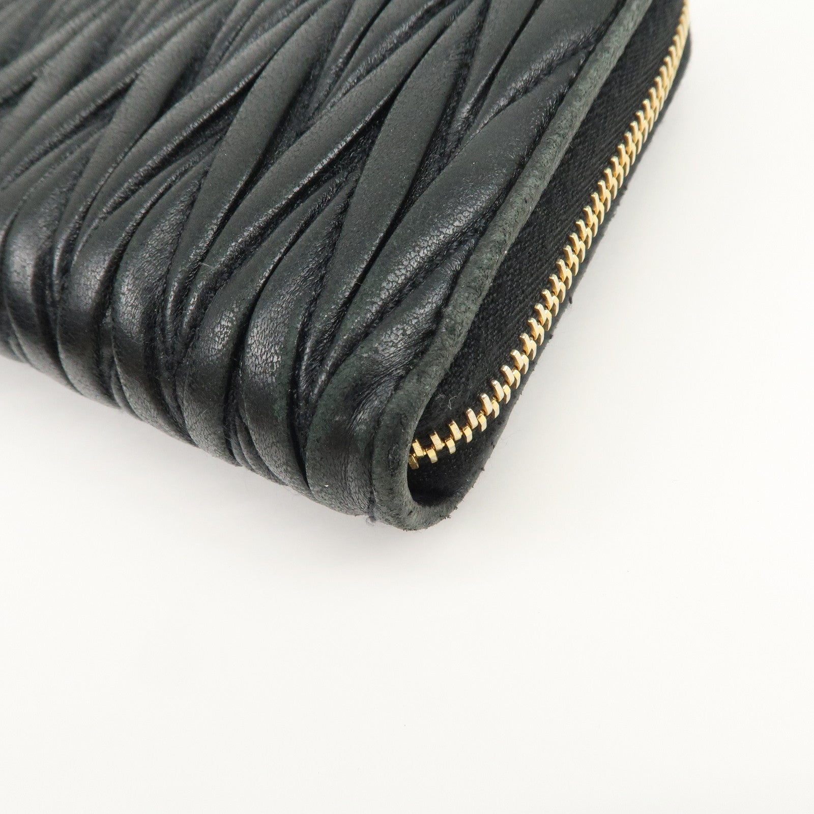 MIU MIU Logo Matelasse Nappa Leather Zippy Long Wallet Black