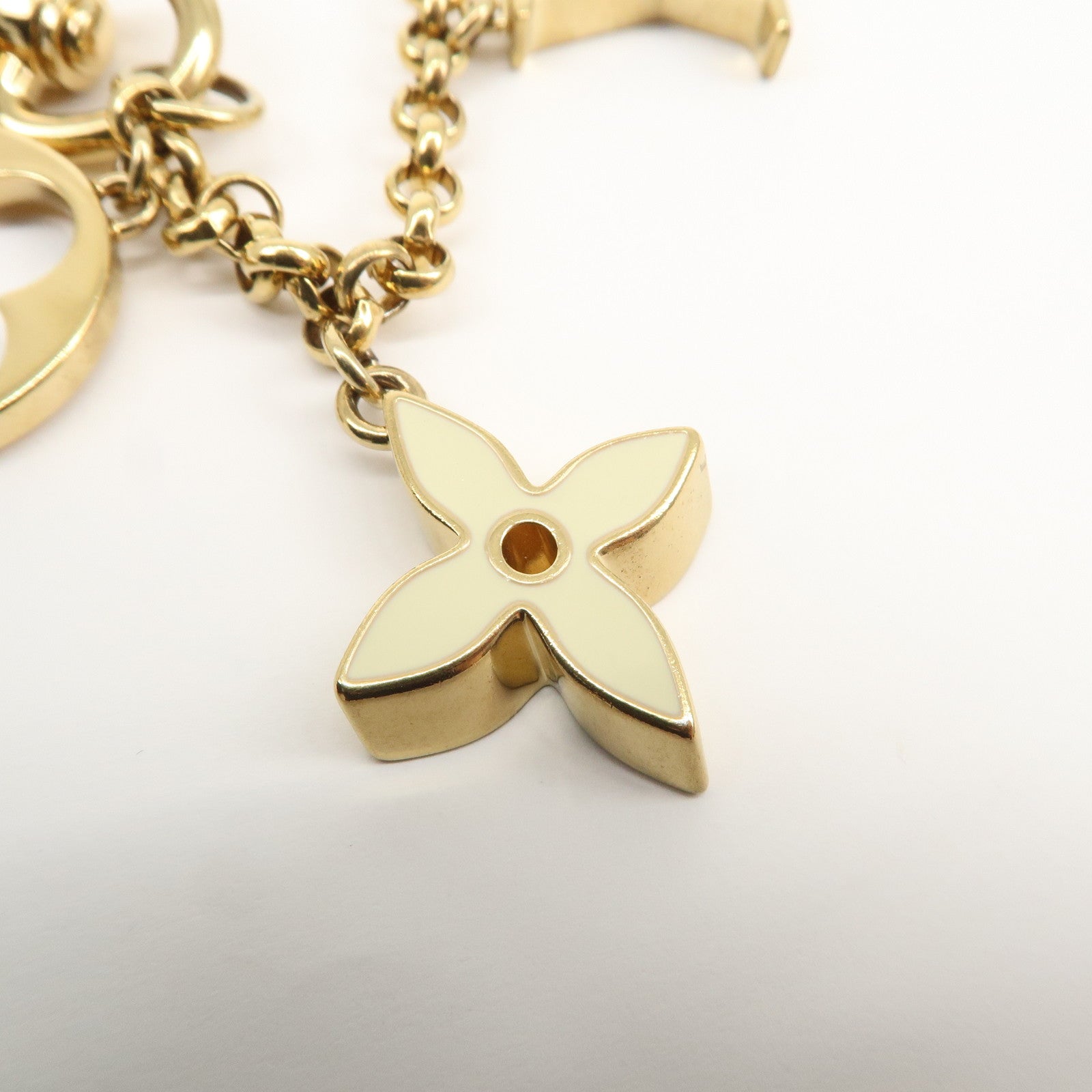 Louis Vuitton Fleur de Monogram Bag Charm Key Chain Gold M65111