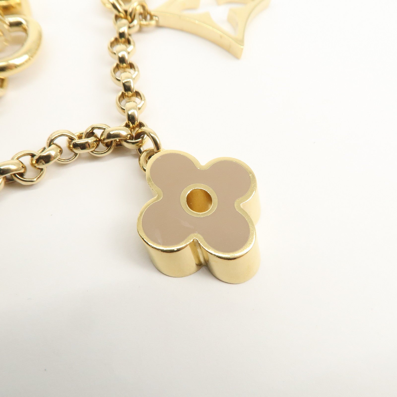 Louis Vuitton Fleur de Monogram Bag Charm Key Chain Gold M65111