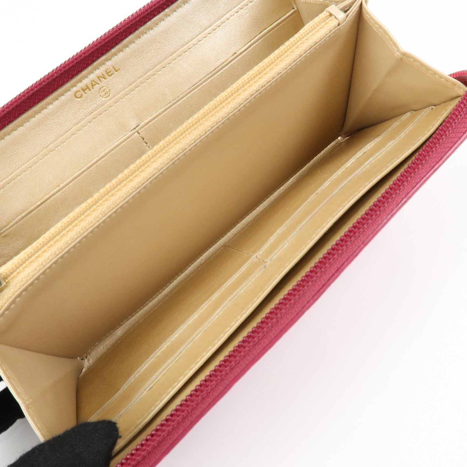 CHANEL Camellia Lamb Skin Round Zippy Wallet Pink A82281