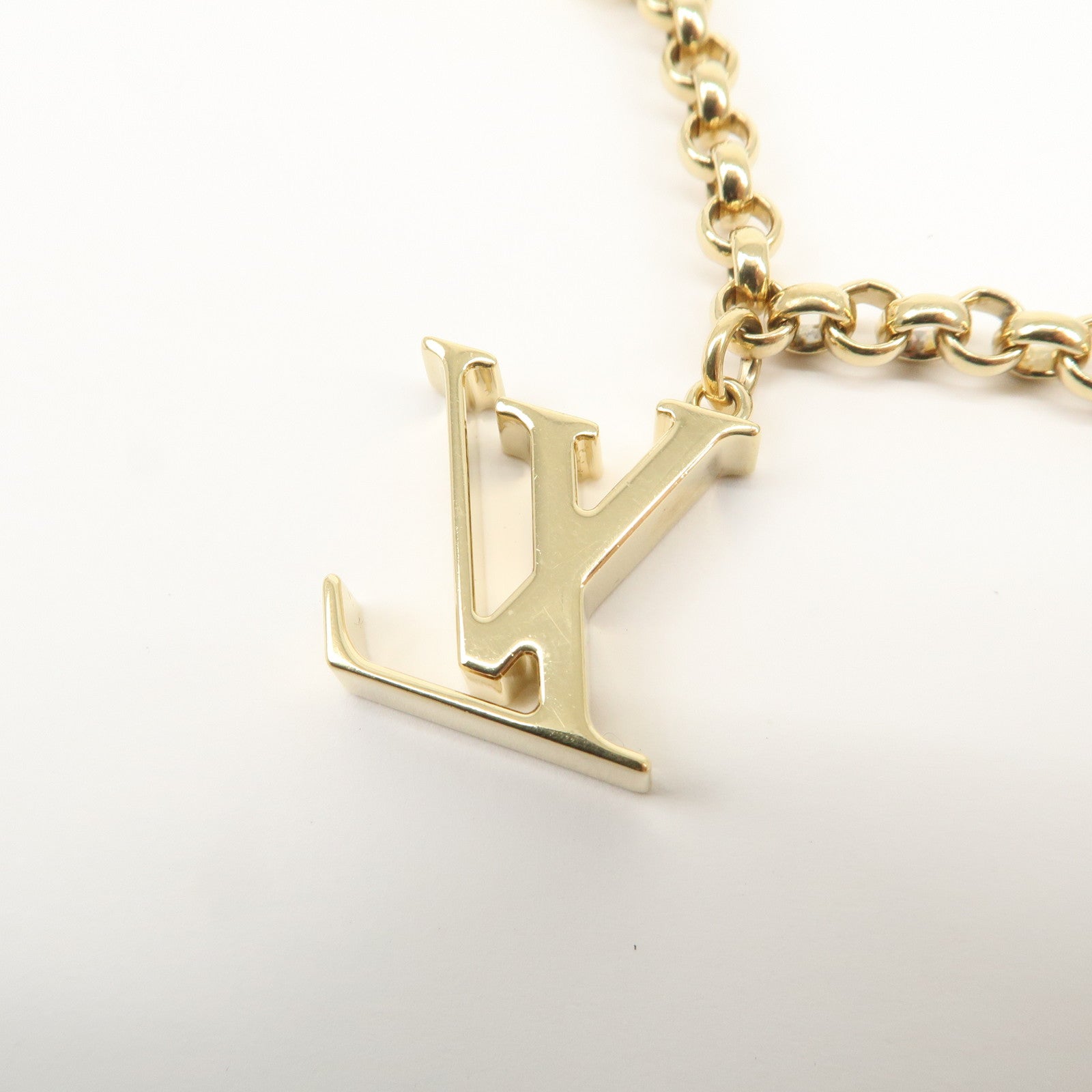 Louis Vuitton Fleur de Monogram Bag Charm Key Chain Gold M65111