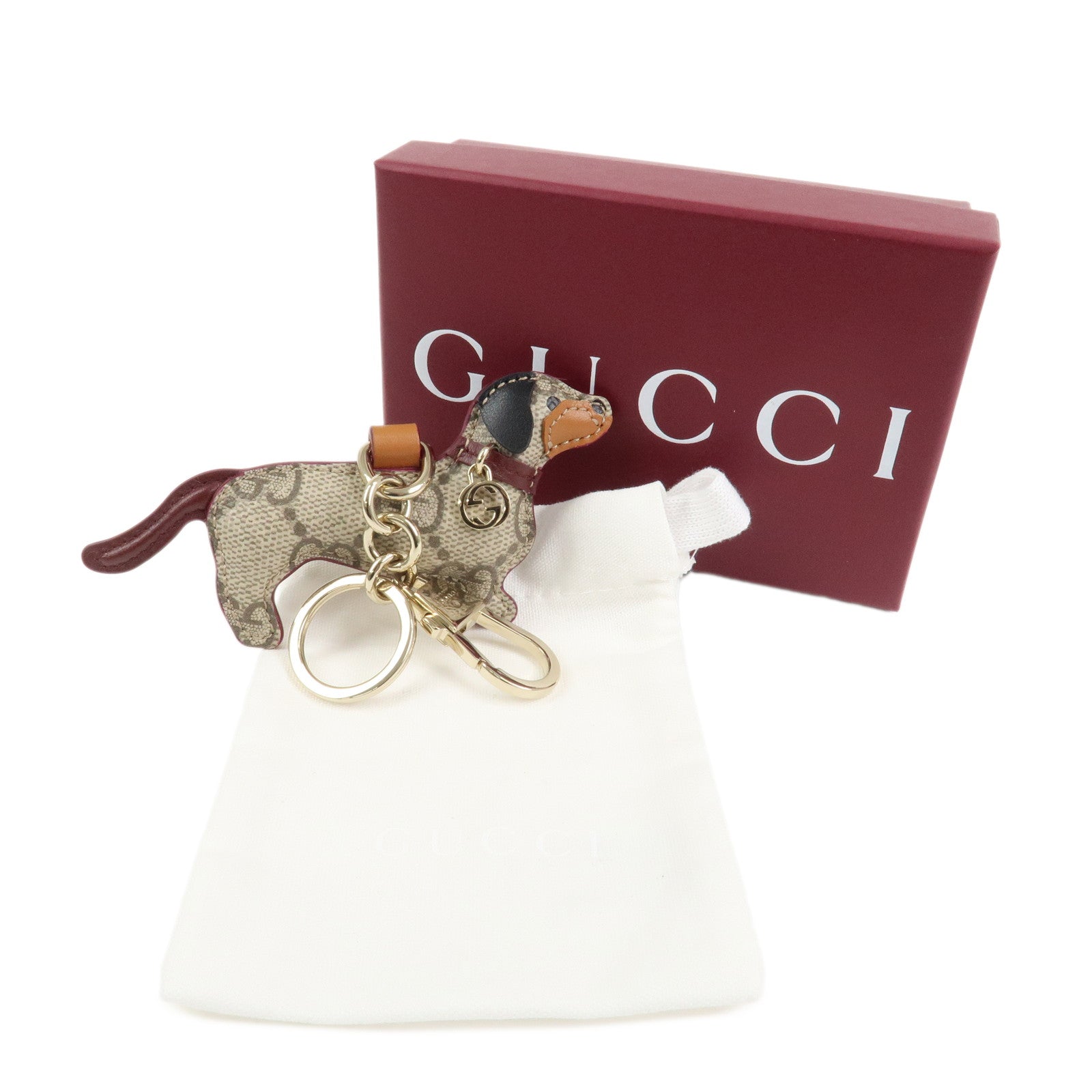 GUCCI GG Emblem Interlocking G Dog Shape Bag Charm Key Chain Beige