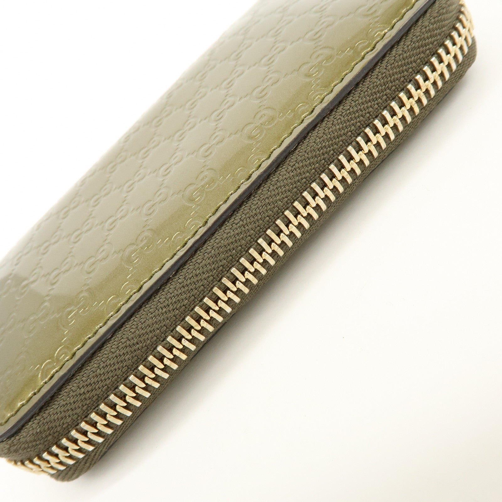 GUCCI Microguccissima Leather Round Zippy Coin Case Khaki 255452