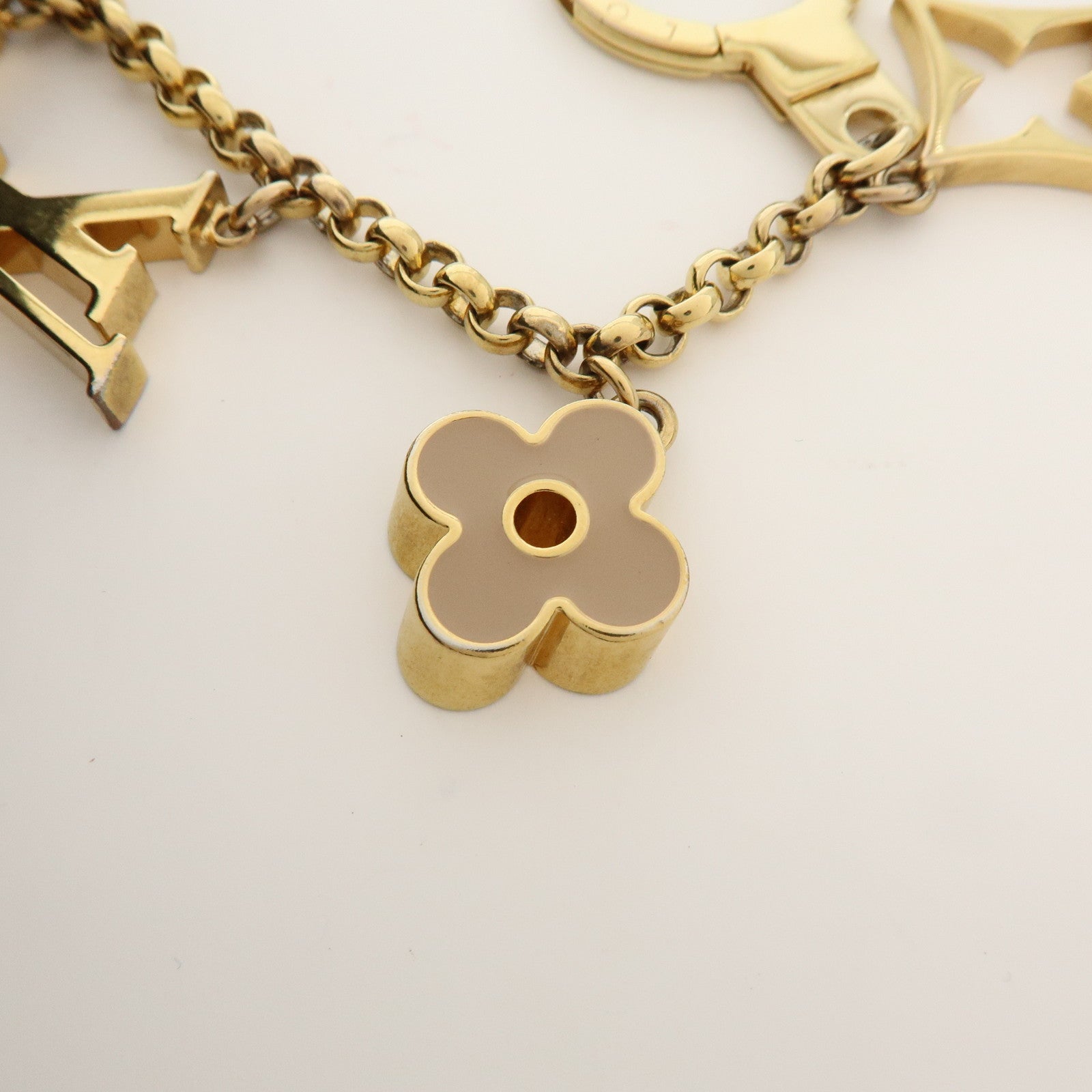 Louis Vuitton Fleur de Monogram Bag Charm Key Chain Gold M65111