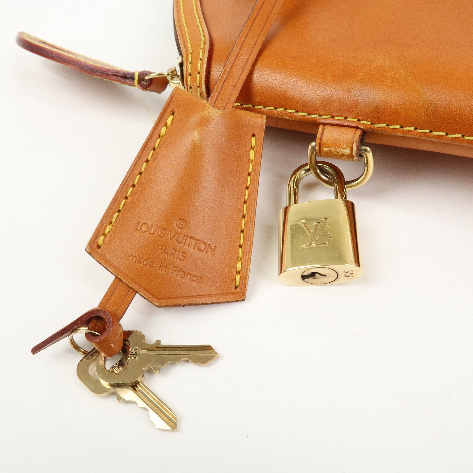 Louis Vuitton Lockit Nomade Leather Hand Bag Caramel Brown M85388