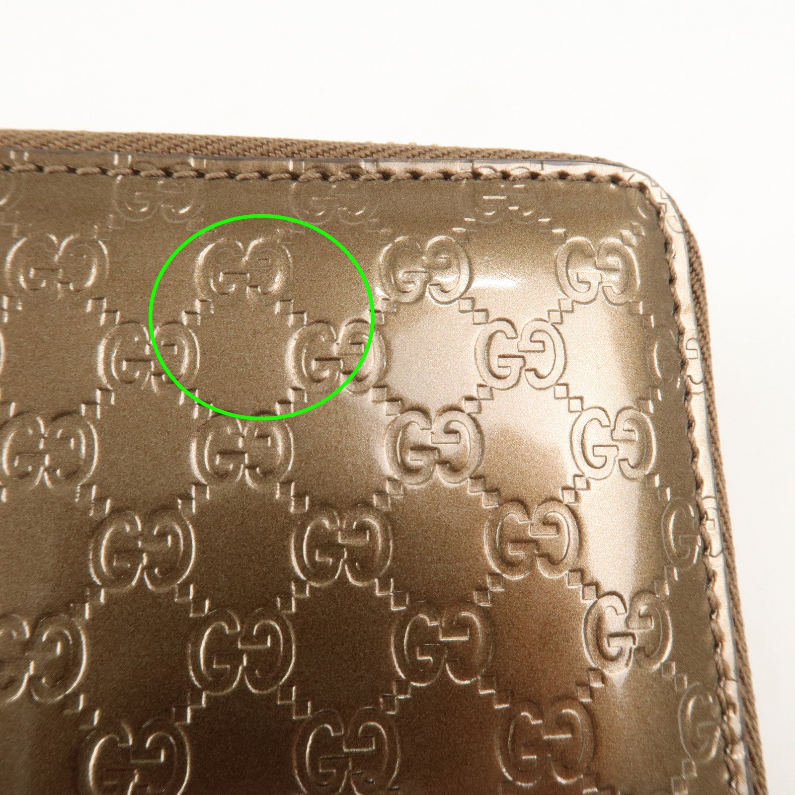 GUCCI Micro Guccissima Leather Zippy Wallet Card Case Bronze 255452