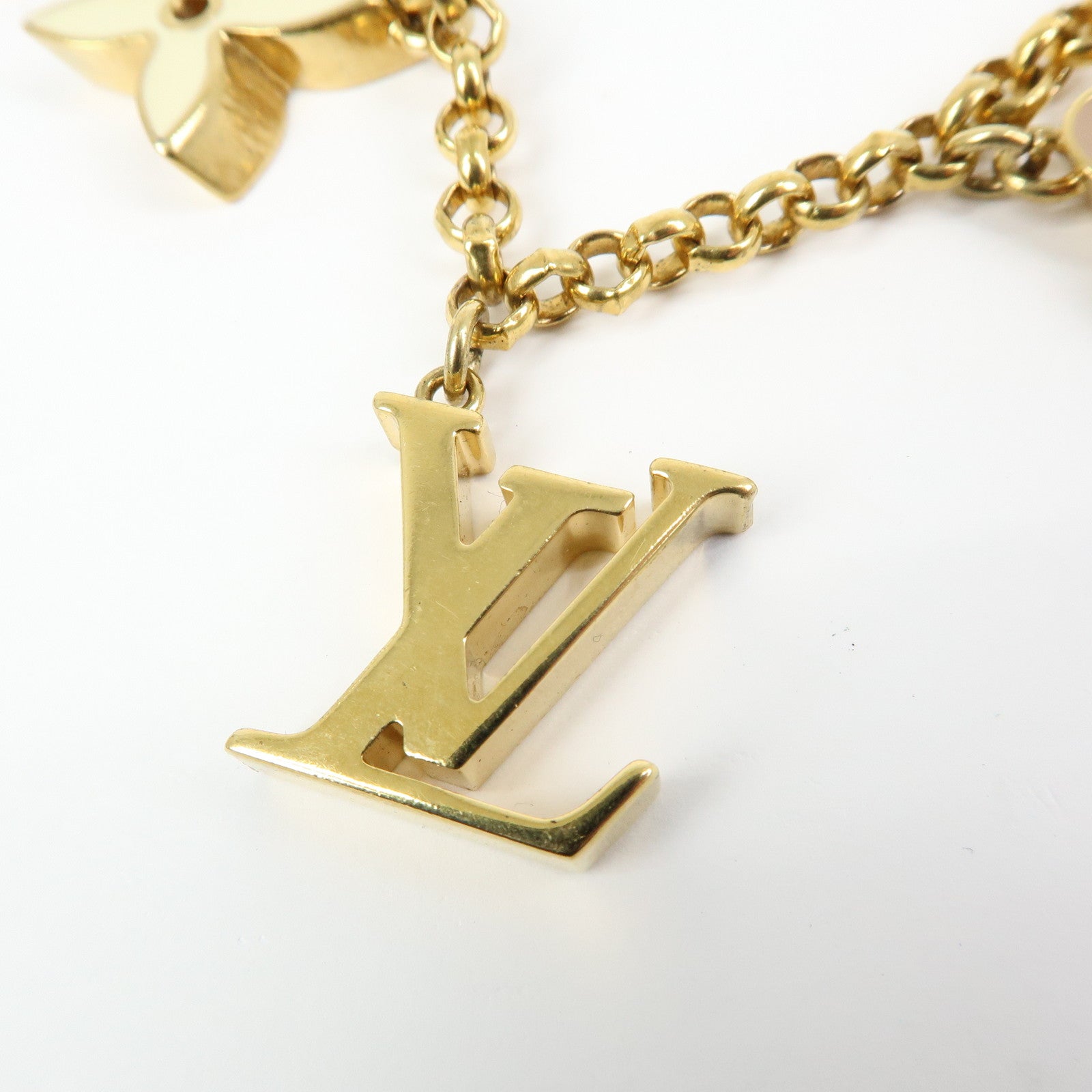 Louis Vuitton Fleur de Monogram Bag Charm Key Chain Gold M65111