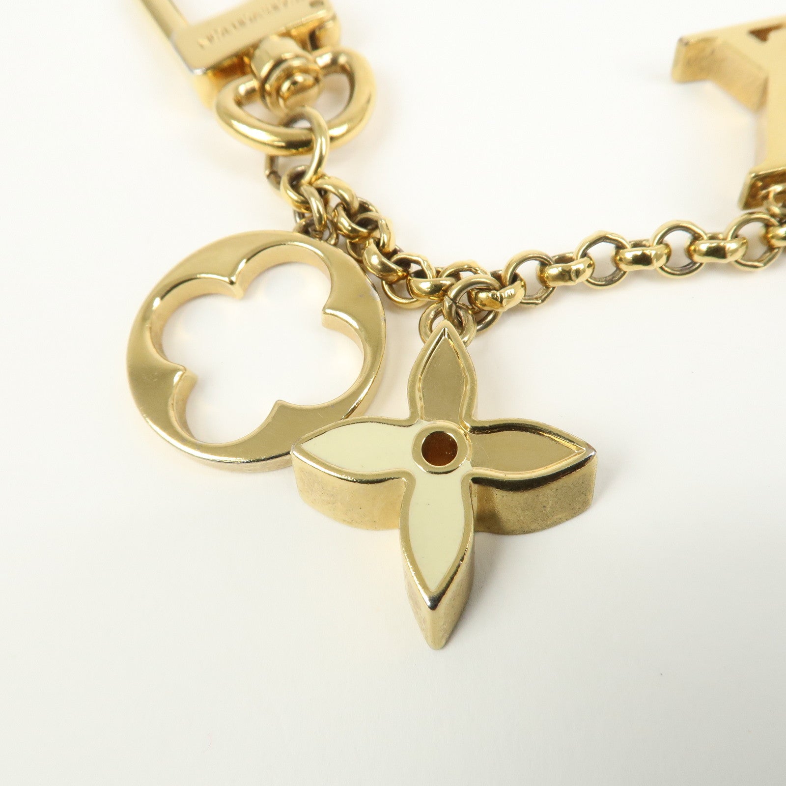 Louis Vuitton Fleur de Monogram Bag Charm Key Chain Gold M65111