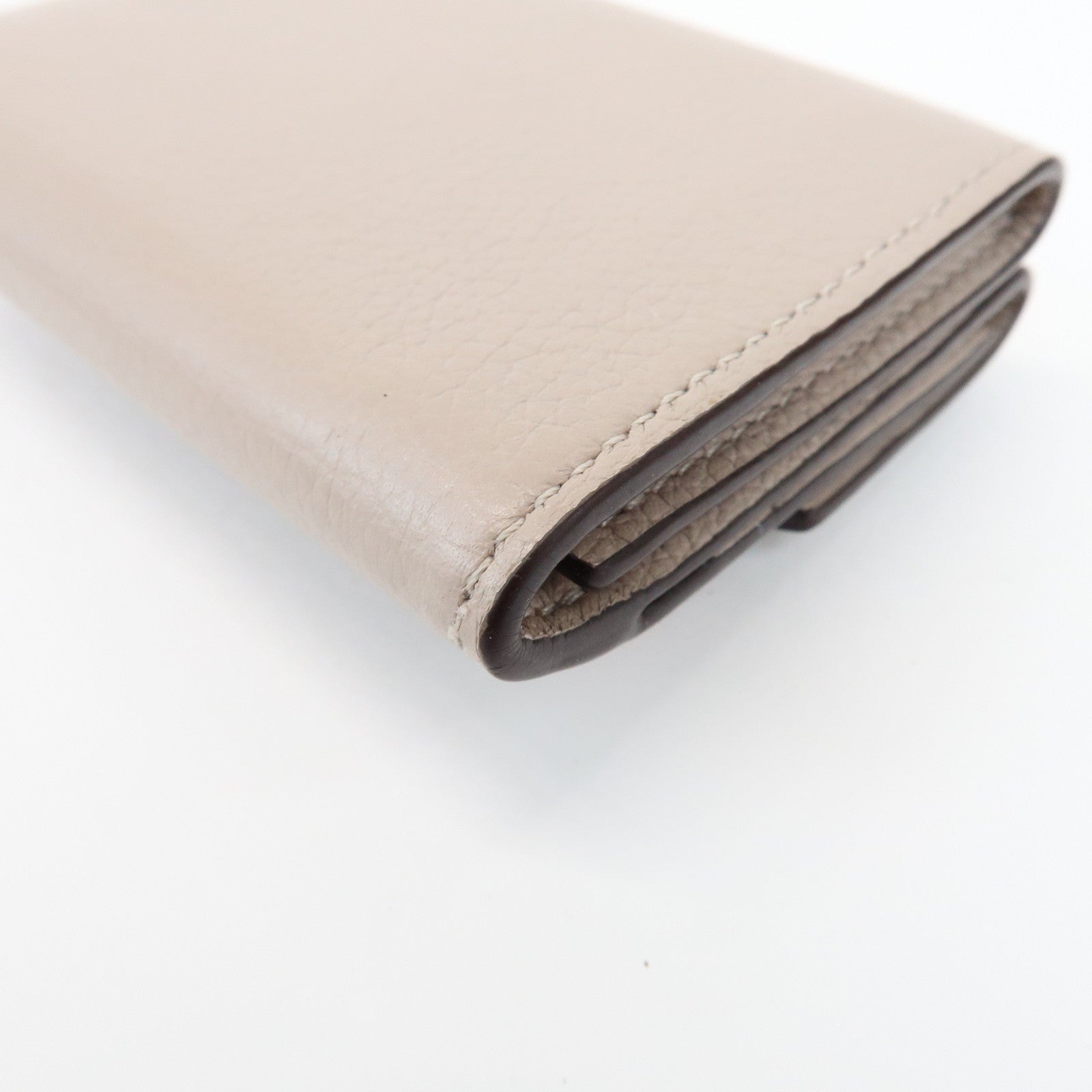 Louis Vuitton Torillon Portefeuille Lock Mini Wallet Greige M69340