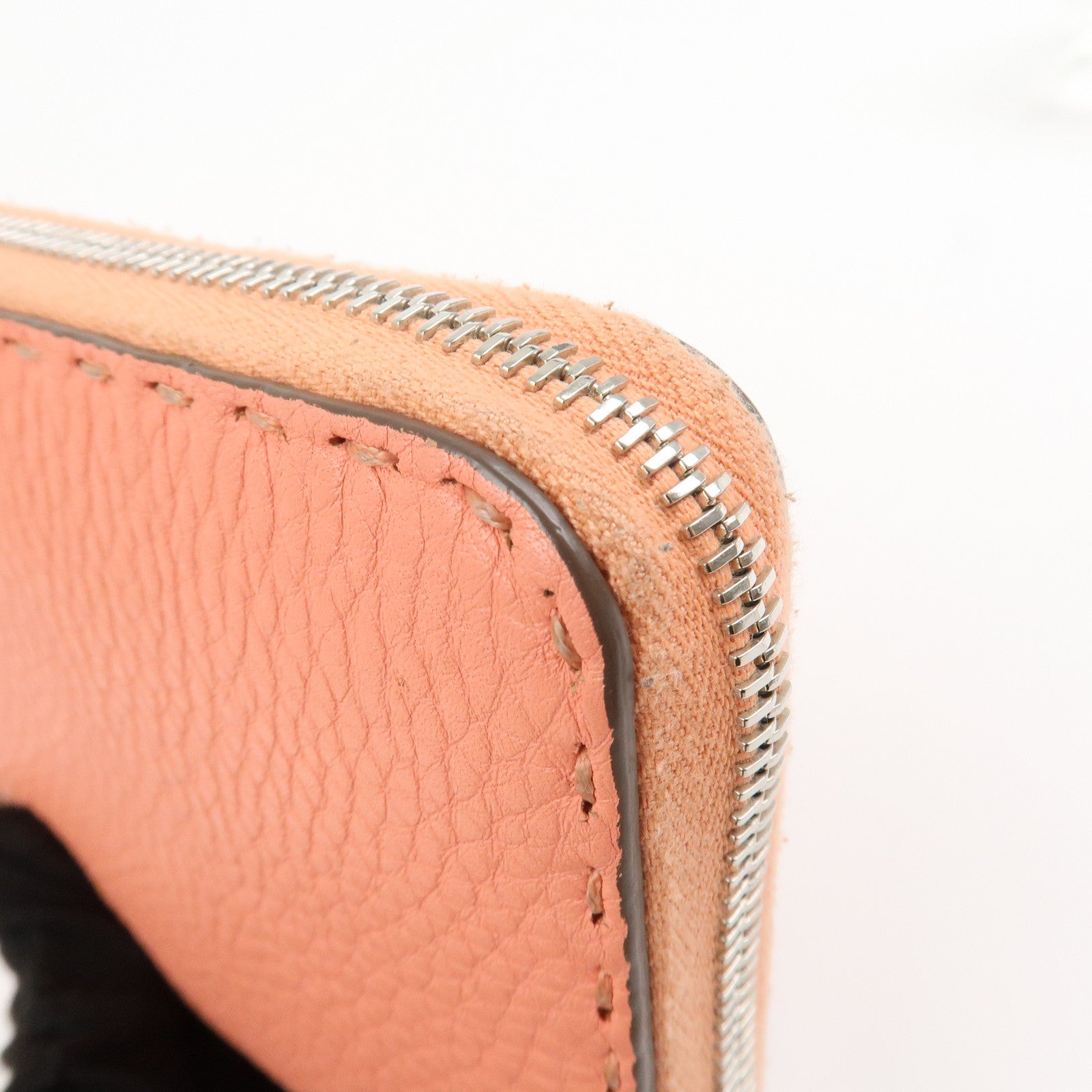 FENDI Leather Round Zippy Long Wallet Pink 8M0299