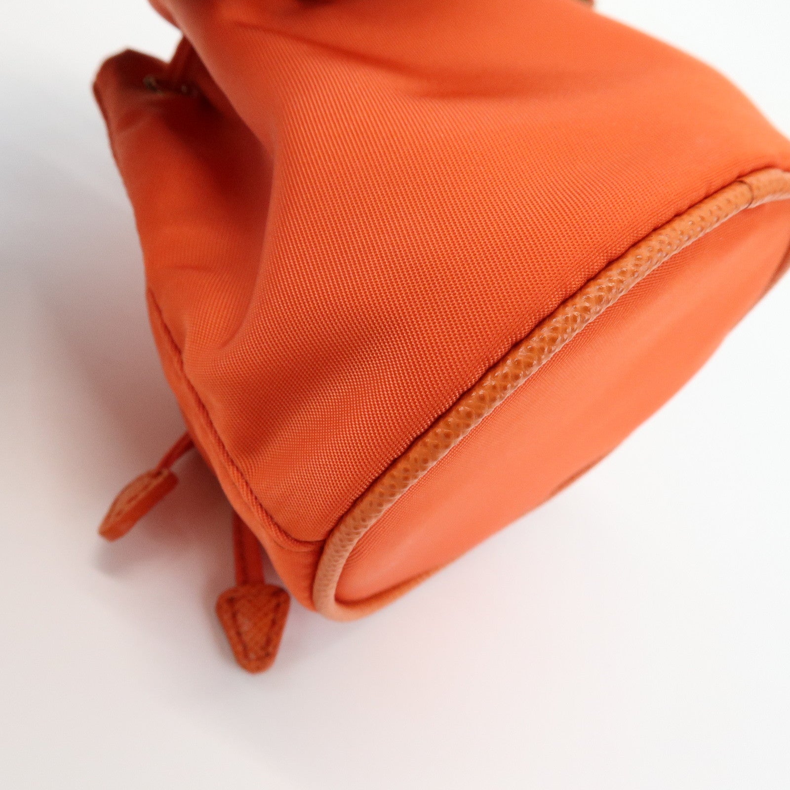 PRADA Triangle Logo Nylon Drawstring Wrist Bag Orange 1TT202