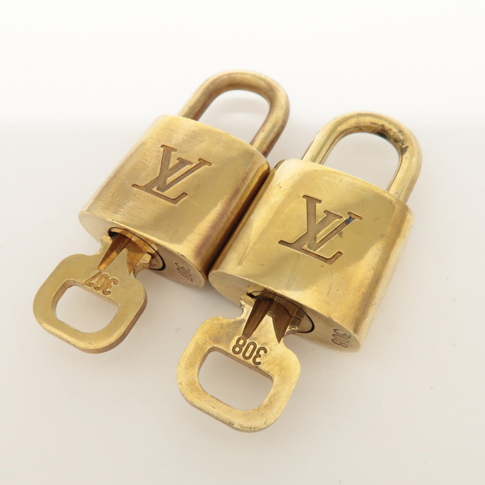 Louis Vuitton Set of 10 Lock & Key Cadena Key Lock Metal Gold