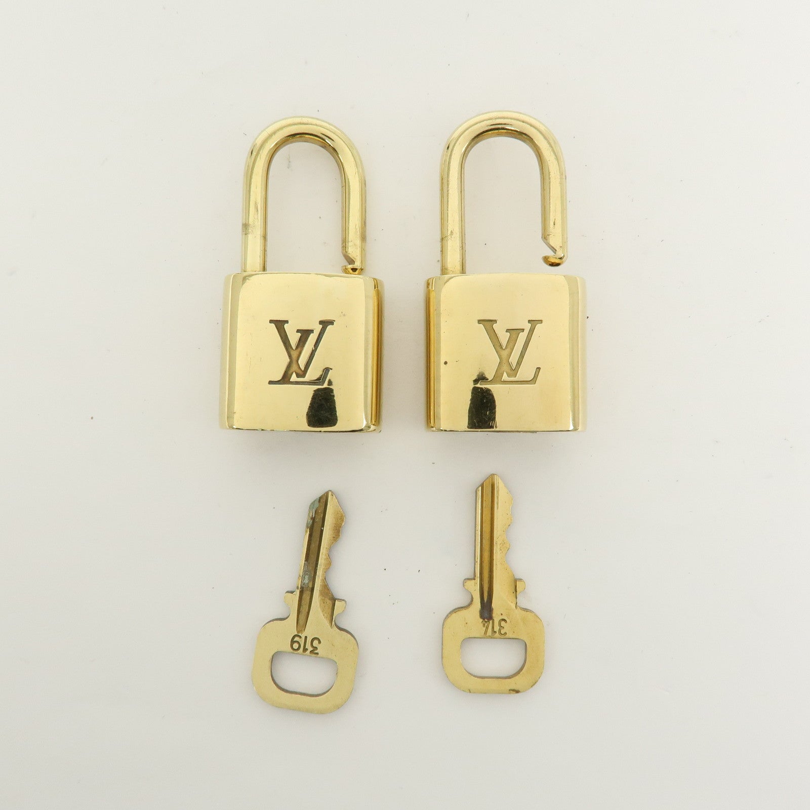 Louis Vuitton Set of 10 Lock & Key Cadena Key Lock Used