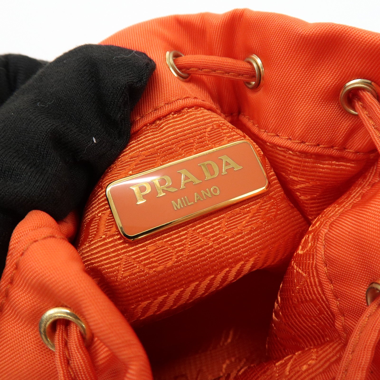 PRADA Triangle Logo Nylon Drawstring Wrist Bag Orange 1TT202