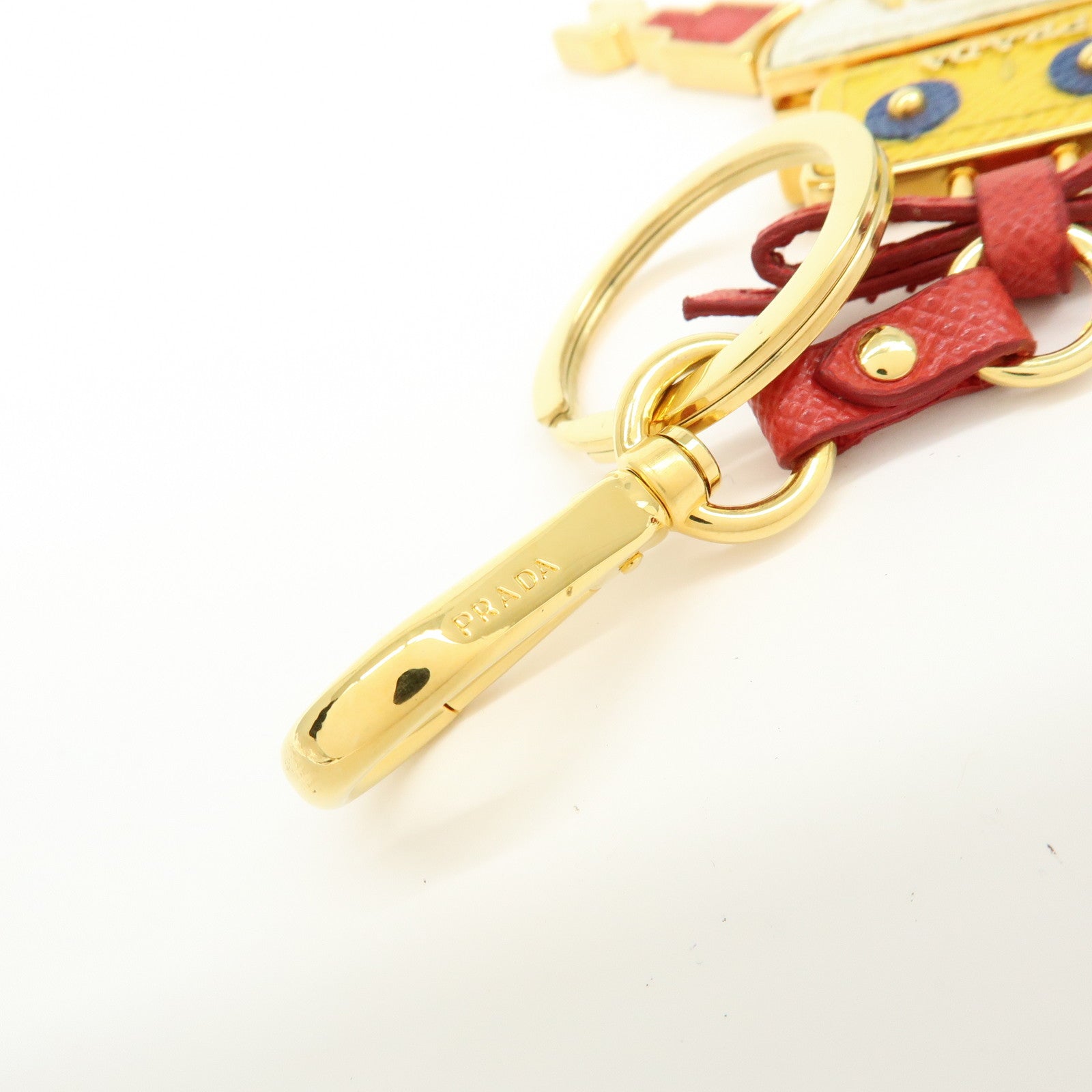 PRADA Saffiano Leather Metal Bag Key Charm Robot White Red 1TL136
