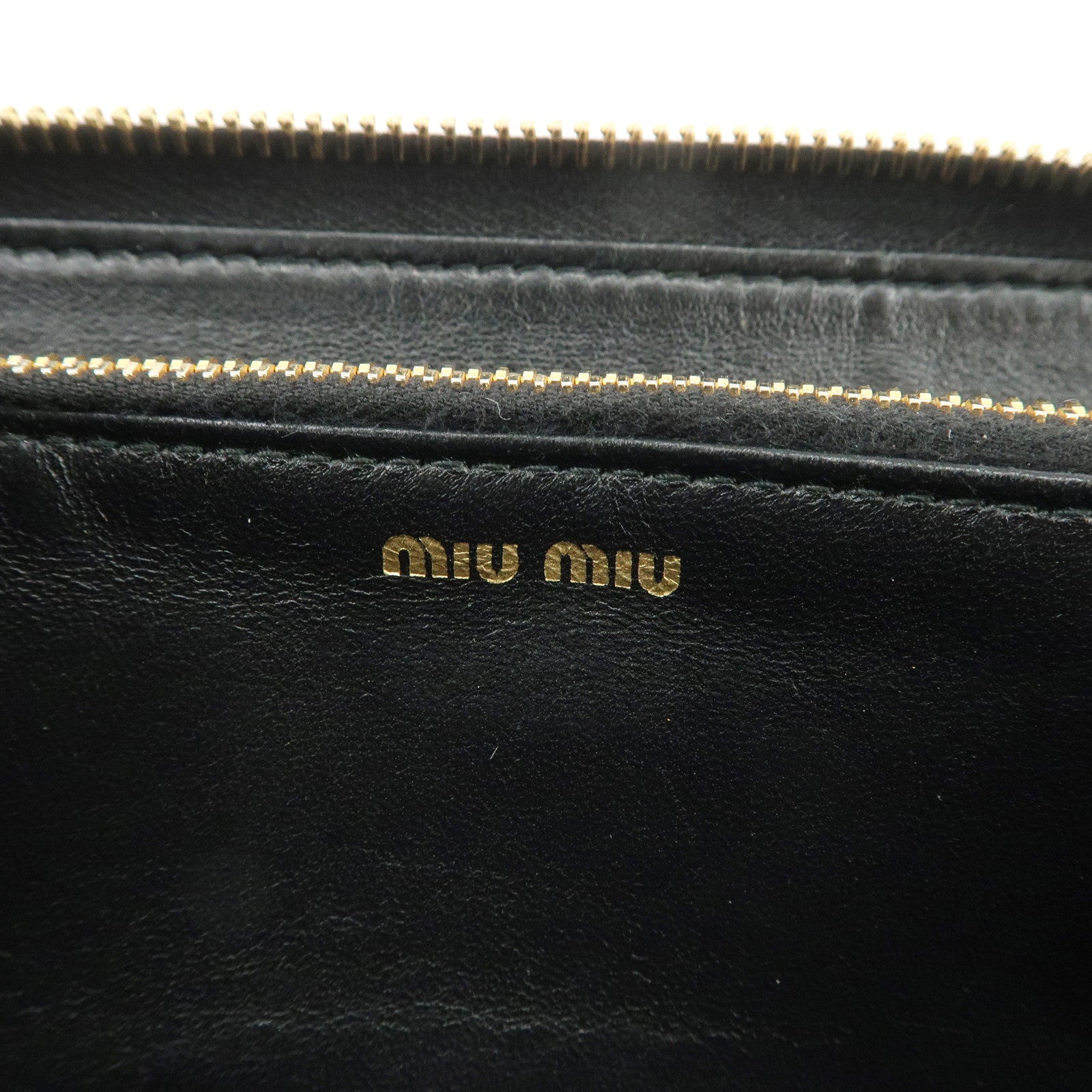 MIU MIU Logo Matelasse Nappa Leather Zippy Long Wallet Black