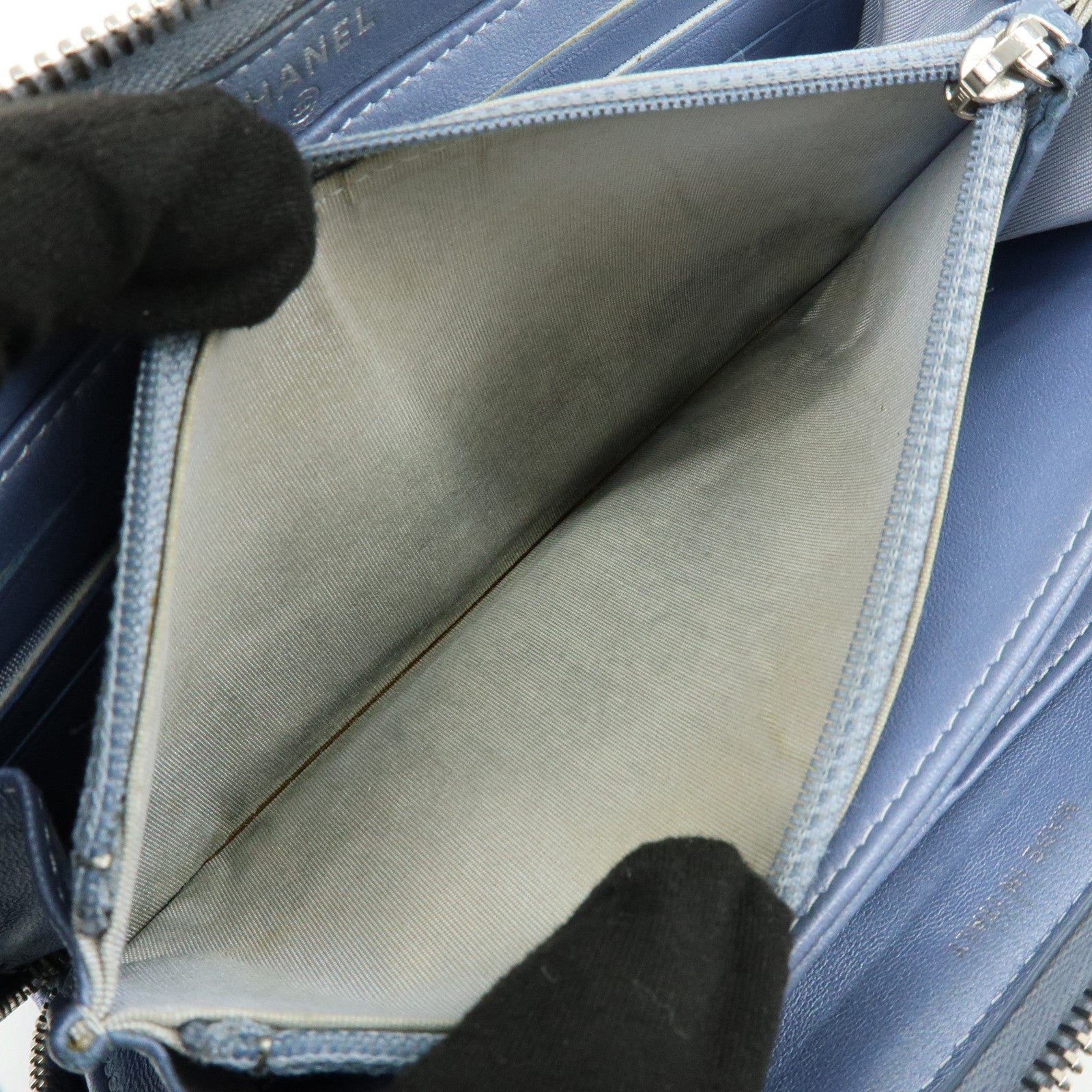 CHANEL Camellia Lamb Skin Round Zippy Wallet Light Blue A82281