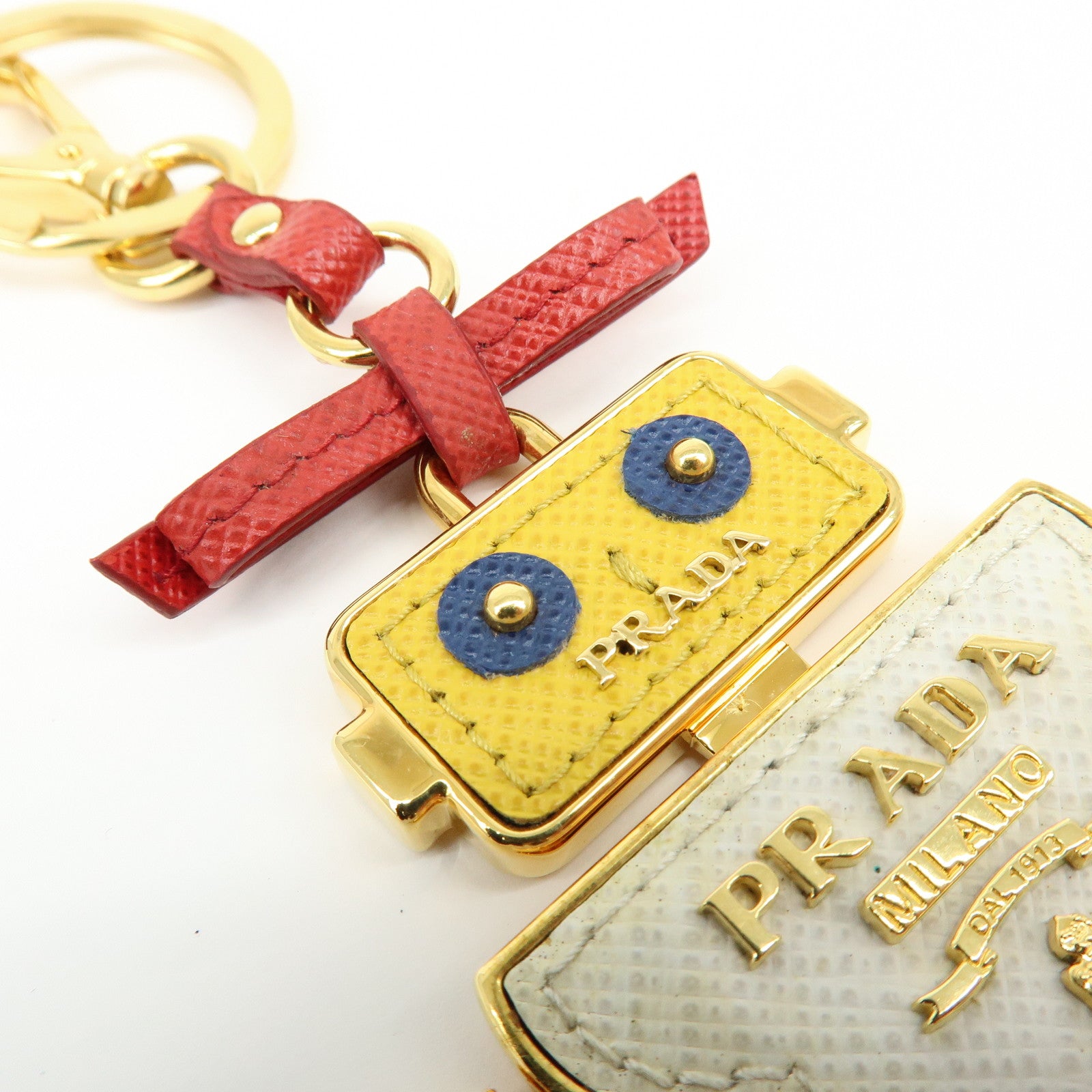 PRADA Saffiano Leather Metal Bag Key Charm Robot White Red 1TL136