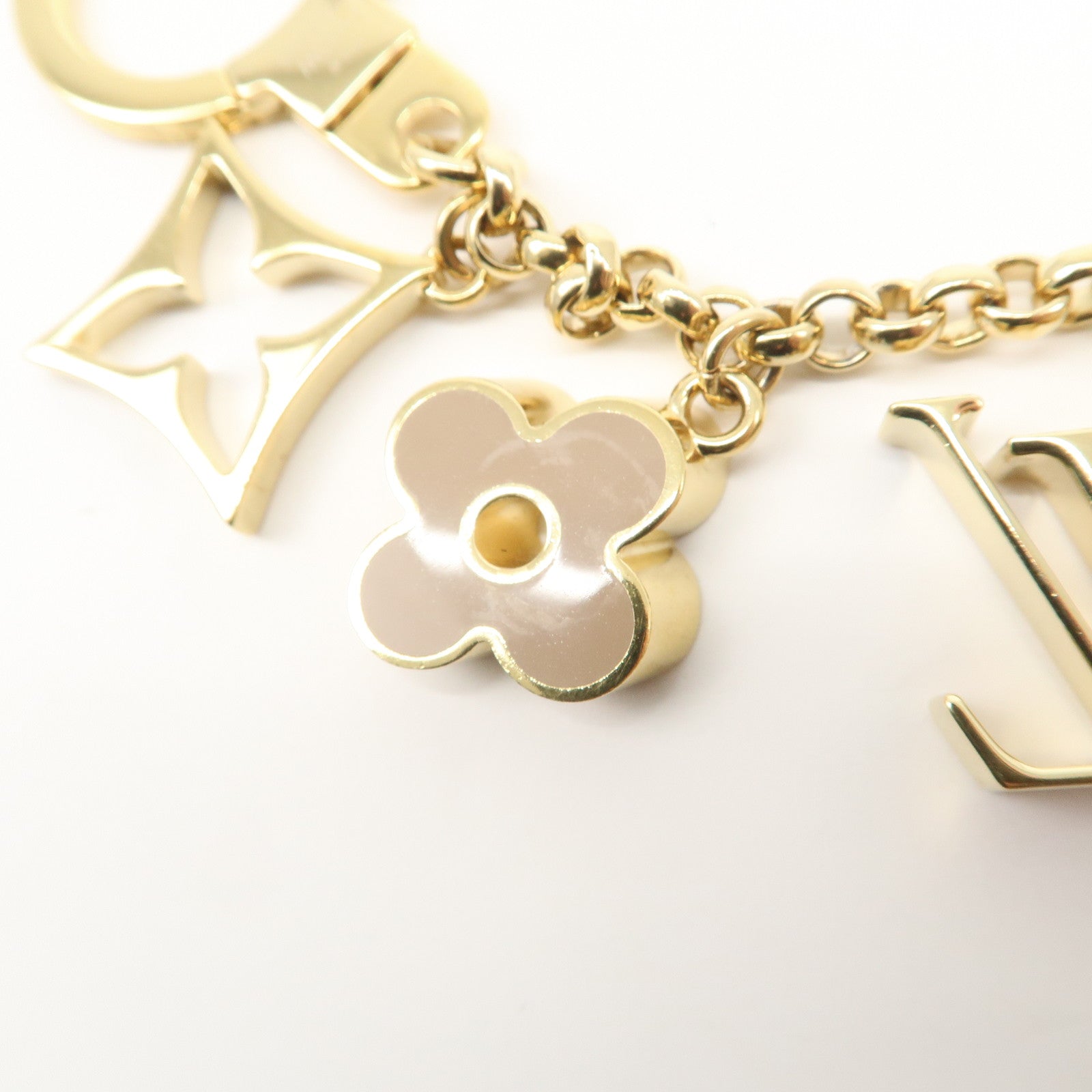 Louis Vuitton Fleur de Monogram Bag Charm Key Chain Gold M65111