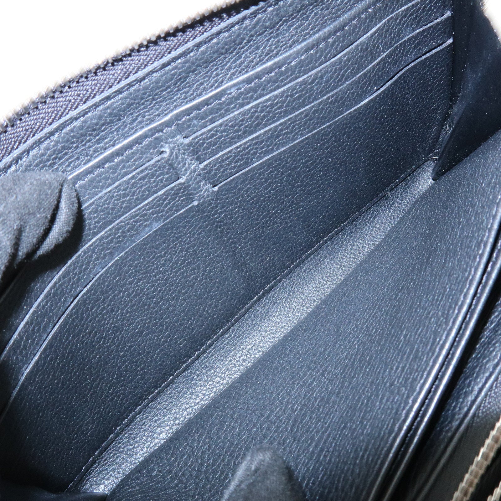 Louis Vuitton Leather Lockme Round Zippy Long Wallet Noir M62622