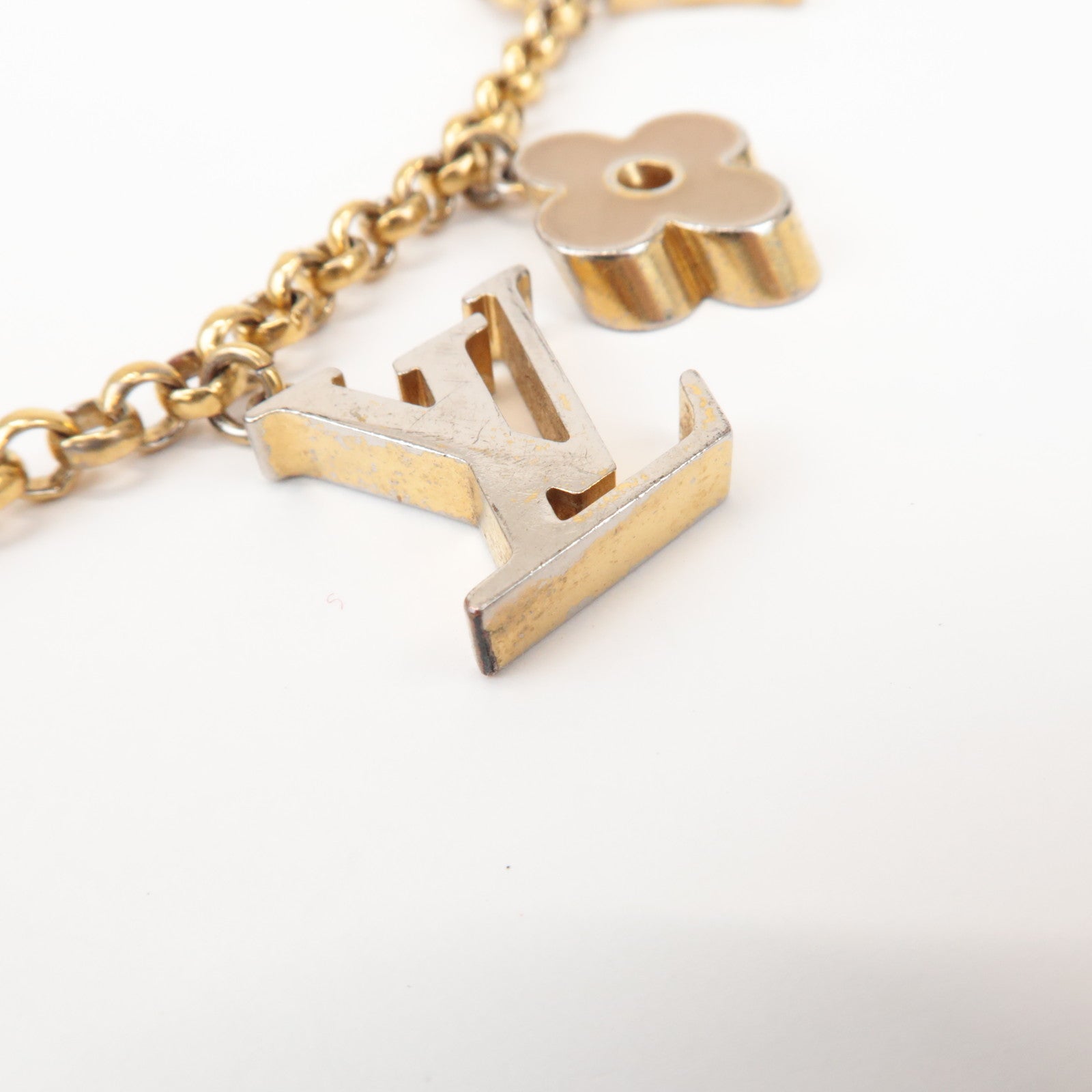 Louis Vuitton Fleur de Monogram Bag Charm Key Chain Gold M65111