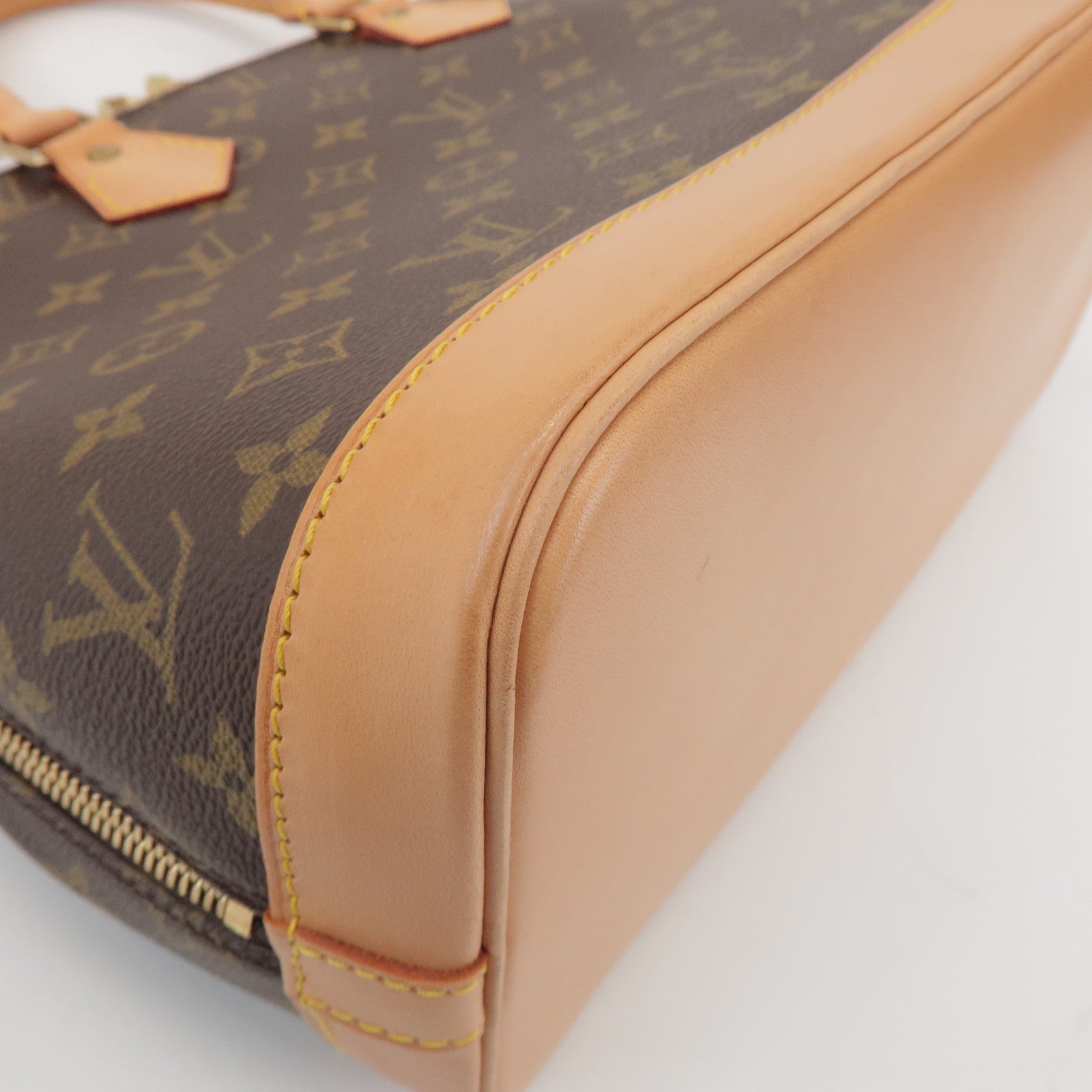 Louis Vuitton Monogram Alma Hand Bag Brown M51130