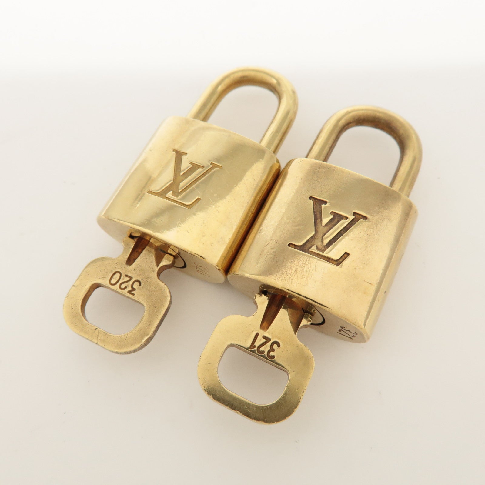 Louis Vuitton Set of 10 Lock & Key Cadena Key Lock Metal Gold