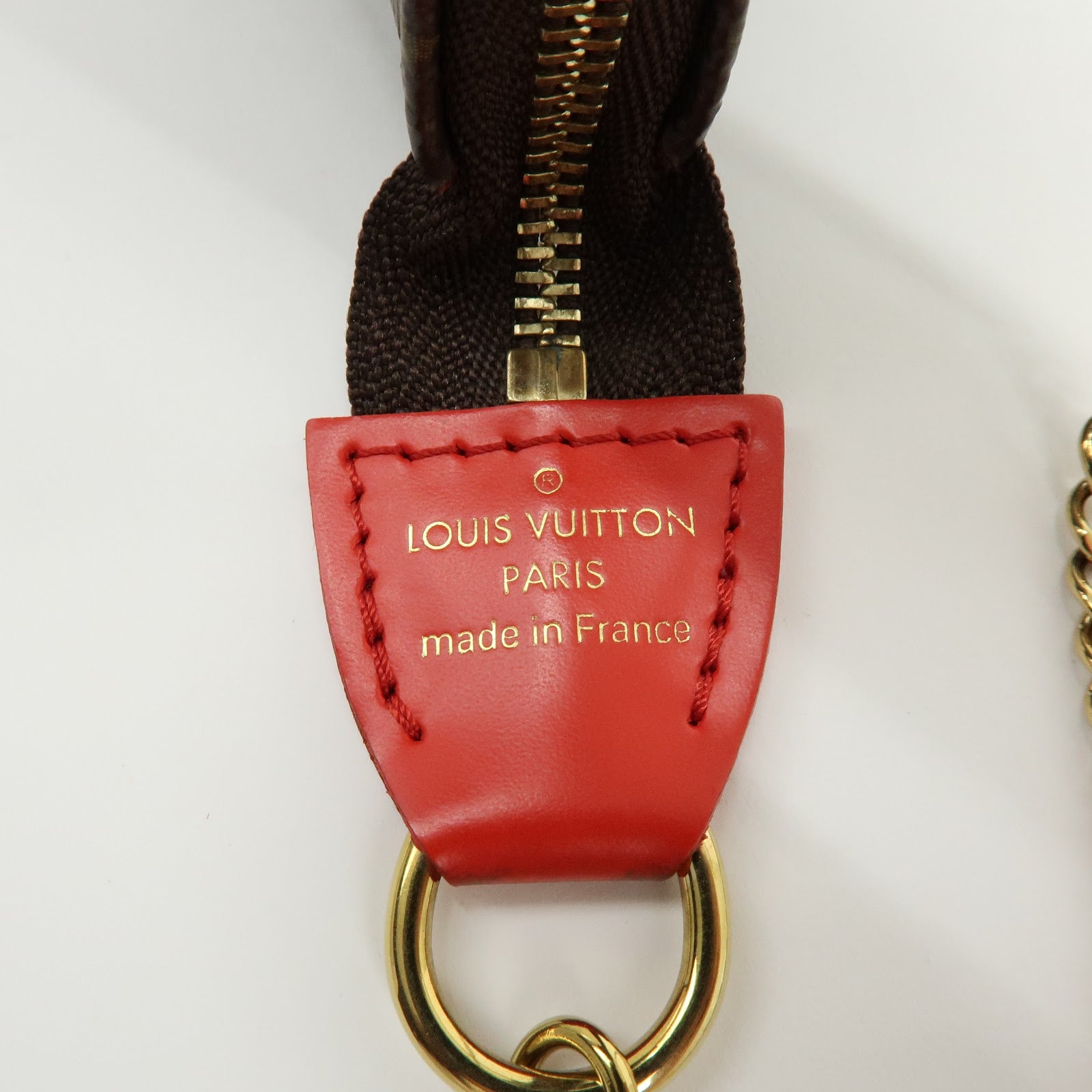 Louis Vuitton Monogram Vivienne Mini Pochette Accessoires M69976