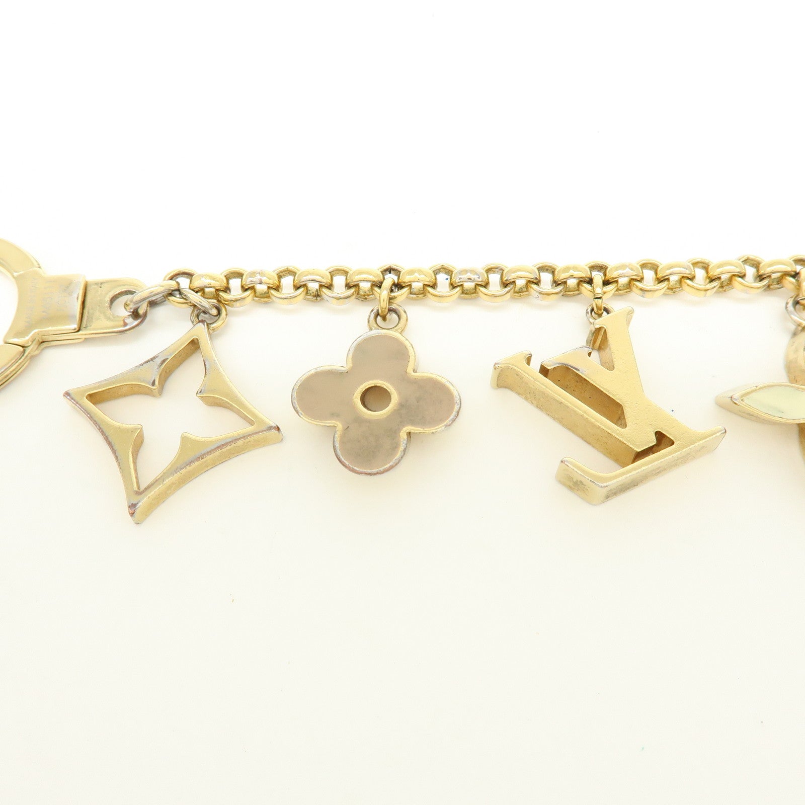 Louis Vuitton Fleur de Monogram Bag Charm Key Chain Gold M65111