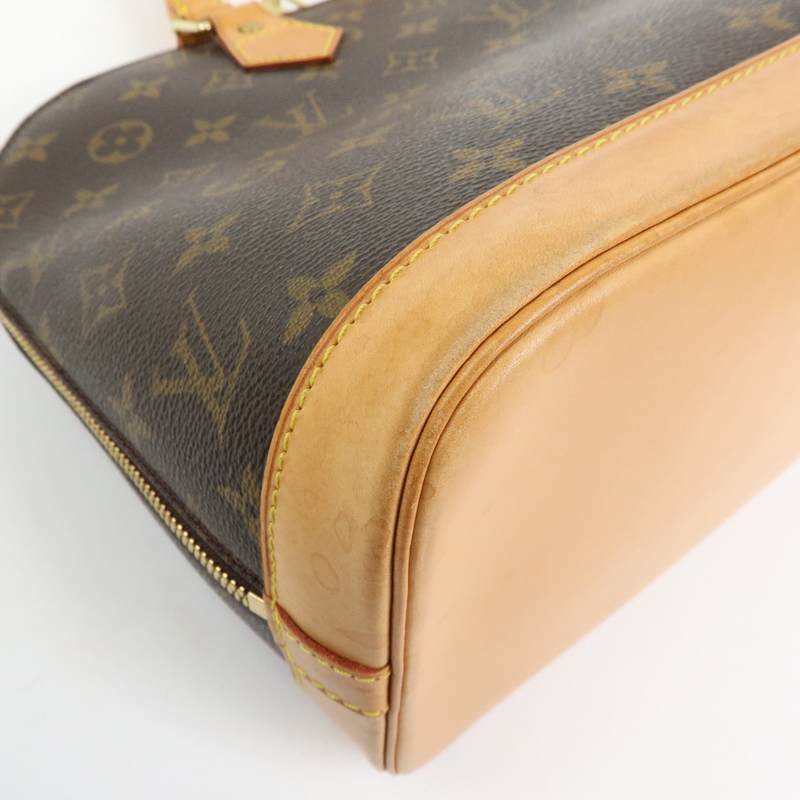 Louis Vuitton Monogram Alma Hand Bag Brown M51130