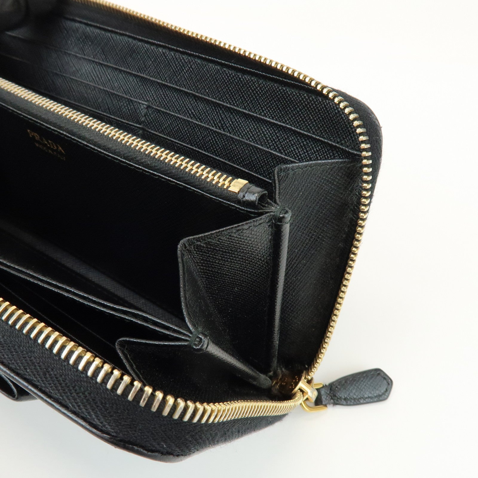 PRADA Saffiano Leather Ribbon Round Zippy Wallet Black 1M0506