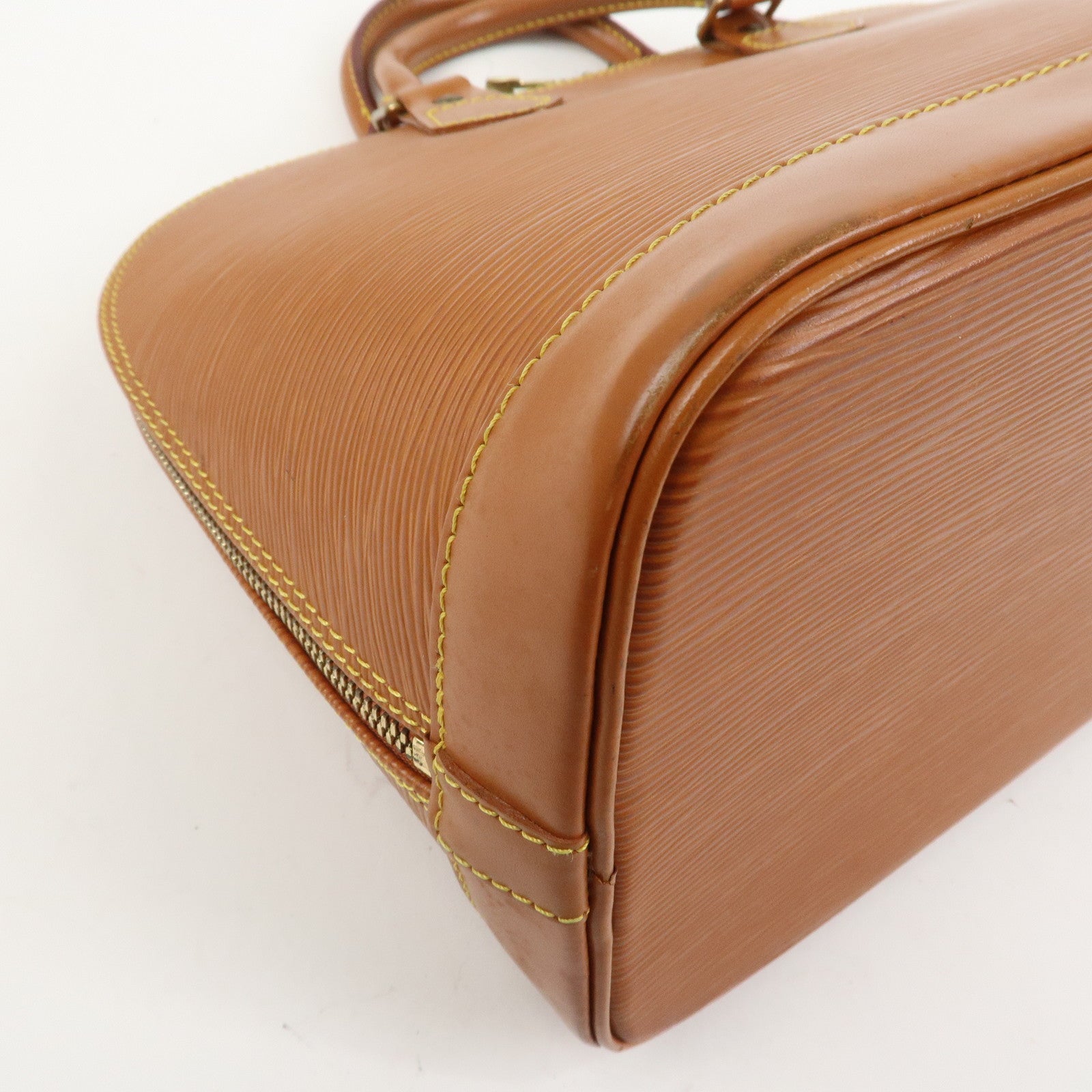 Louis Vuitton Epi Alma Hand Bag Zipang Gold M54148