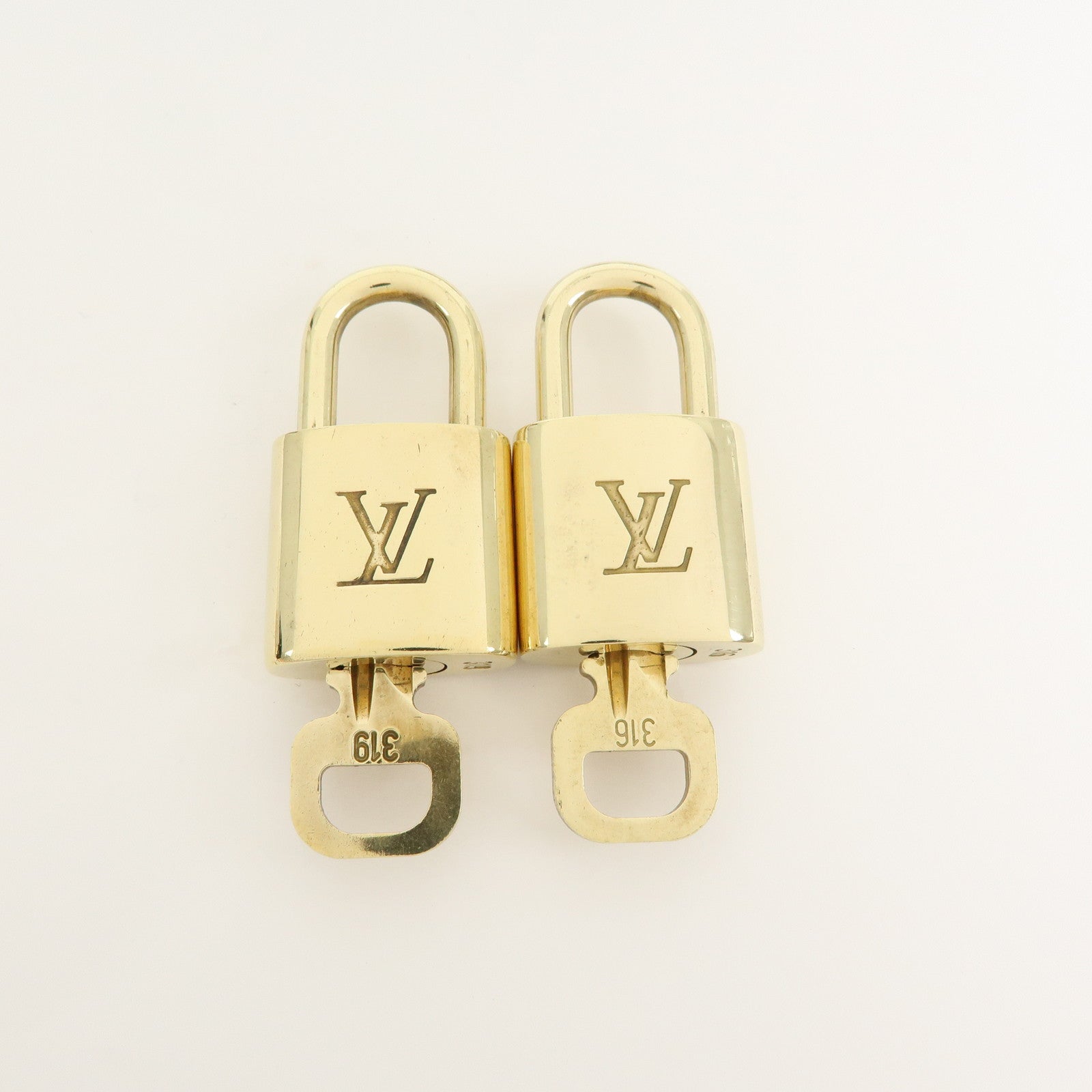 Louis Vuitton Set of 10 Lock & Key Cadena Key Lock Gold