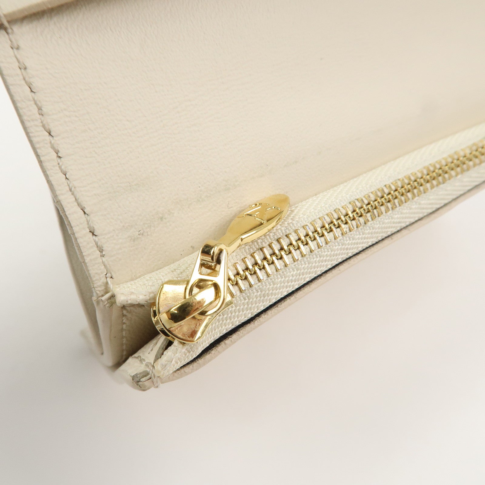 Louis Vuitton Capcines Taurillon Leather Vertical Wallet M11169