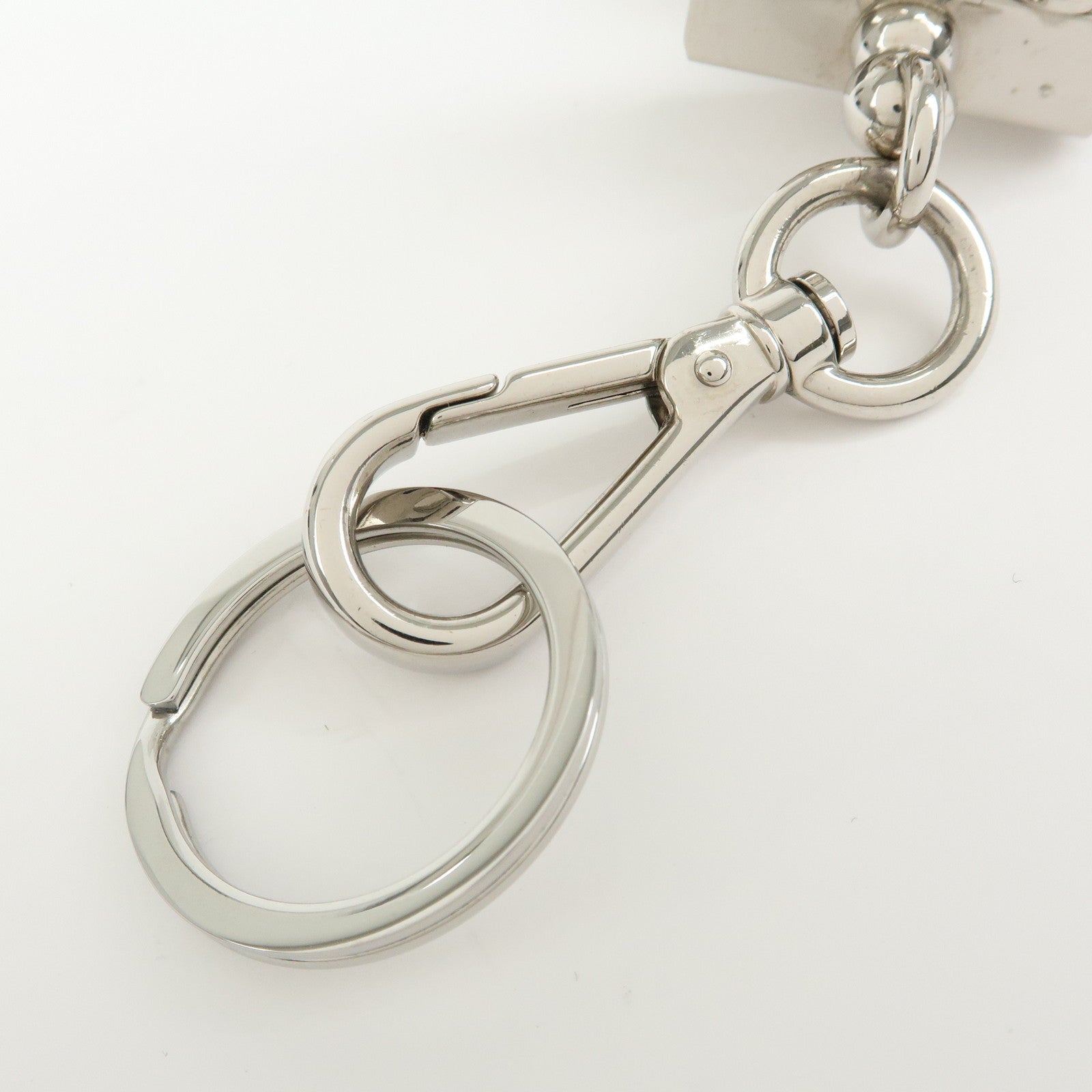 PRADA Triangle Logo Metal Saffiano Leather Robot Bag Charm 2TR103