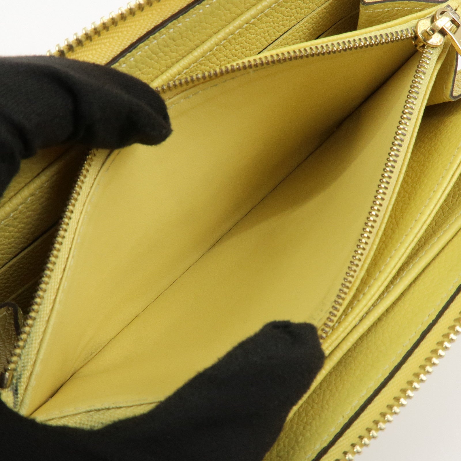 Louis Vuitton Monogram Empreinte Round Zippy Wallet Jaune M82043